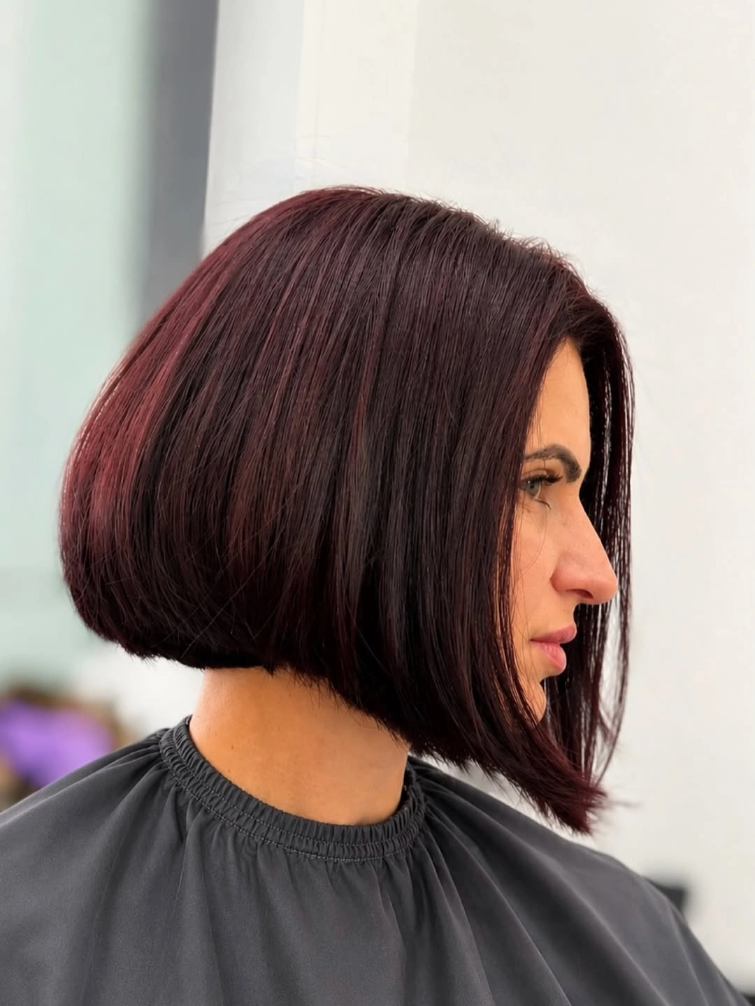 bobbed haircut for women Deep Burgundy Angled Bob With Elegant Volume