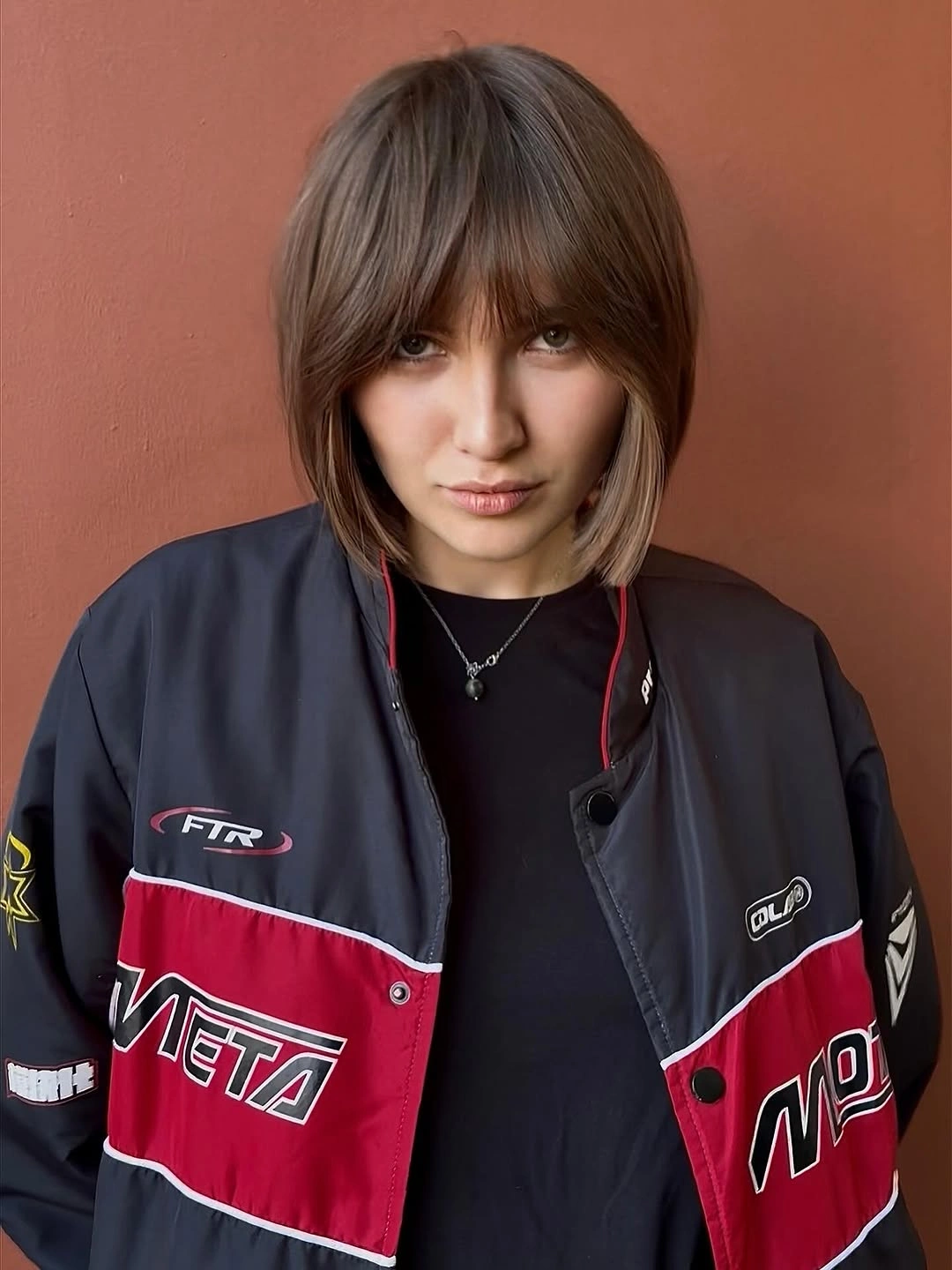 bobbed haircut for women Classic French-Inspired Bob With Feathered Bangs