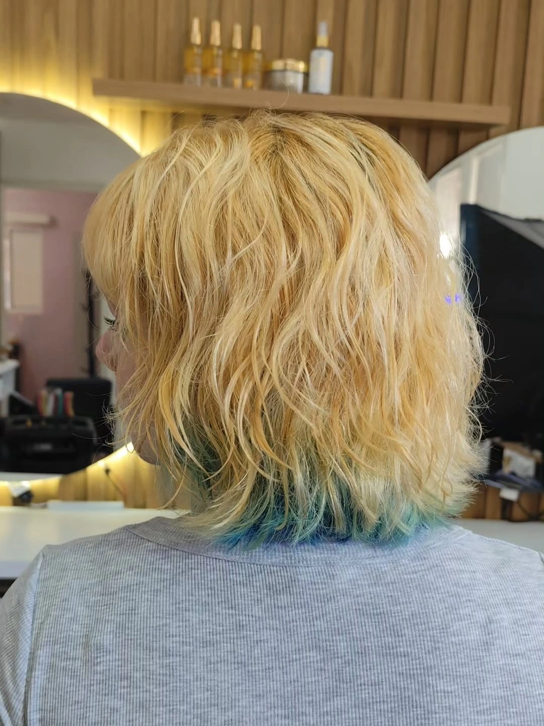 bobbed haircut for women Textured Blonde Bob With Hidden Pastel Accent