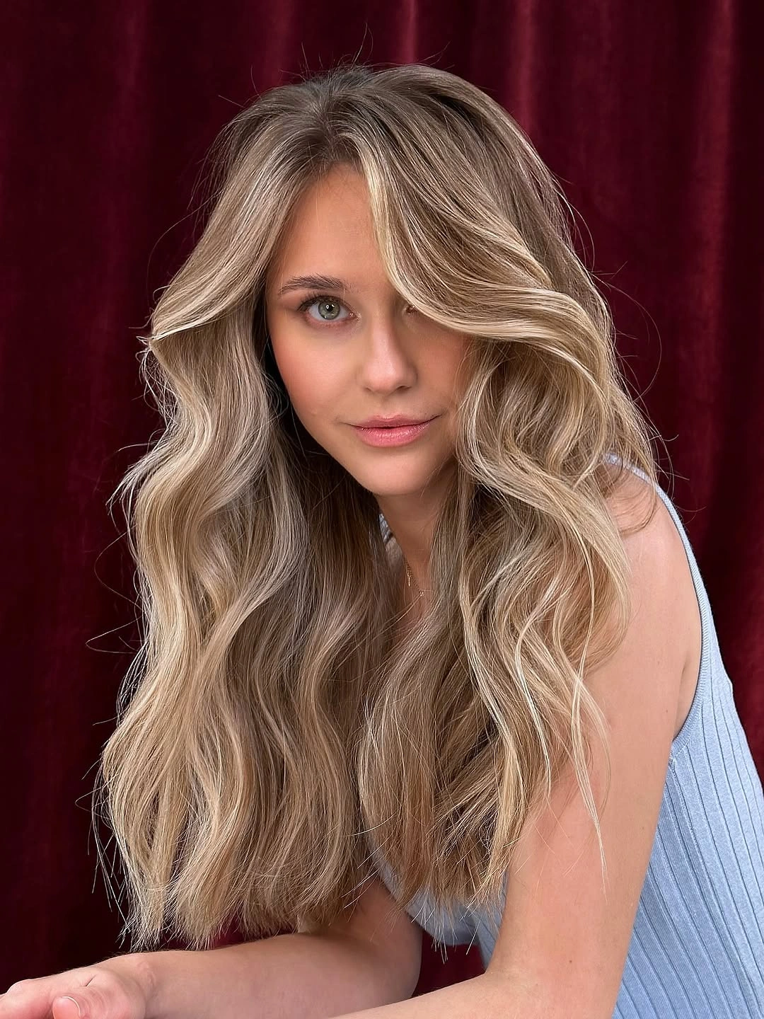 body waves hairstyle Soft Beige Blonde Body Waves With Airy Face-Framing Layers