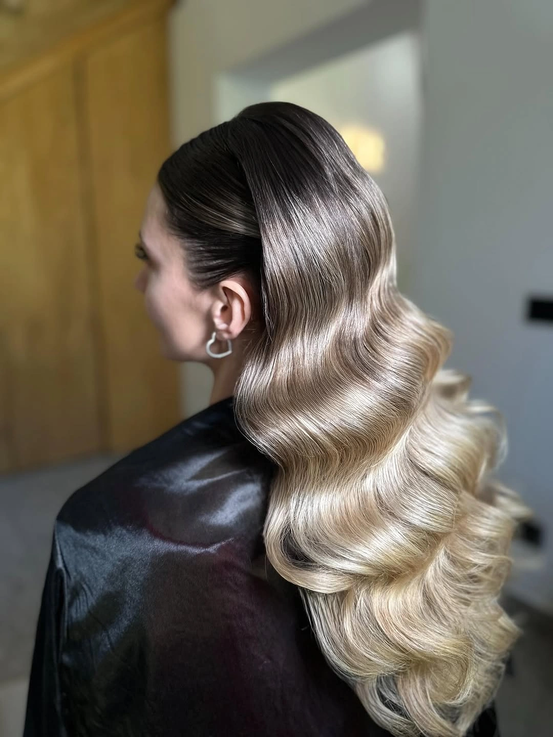 body waves hairstyle Champagne Blonde Waves With a Hollywood Finish