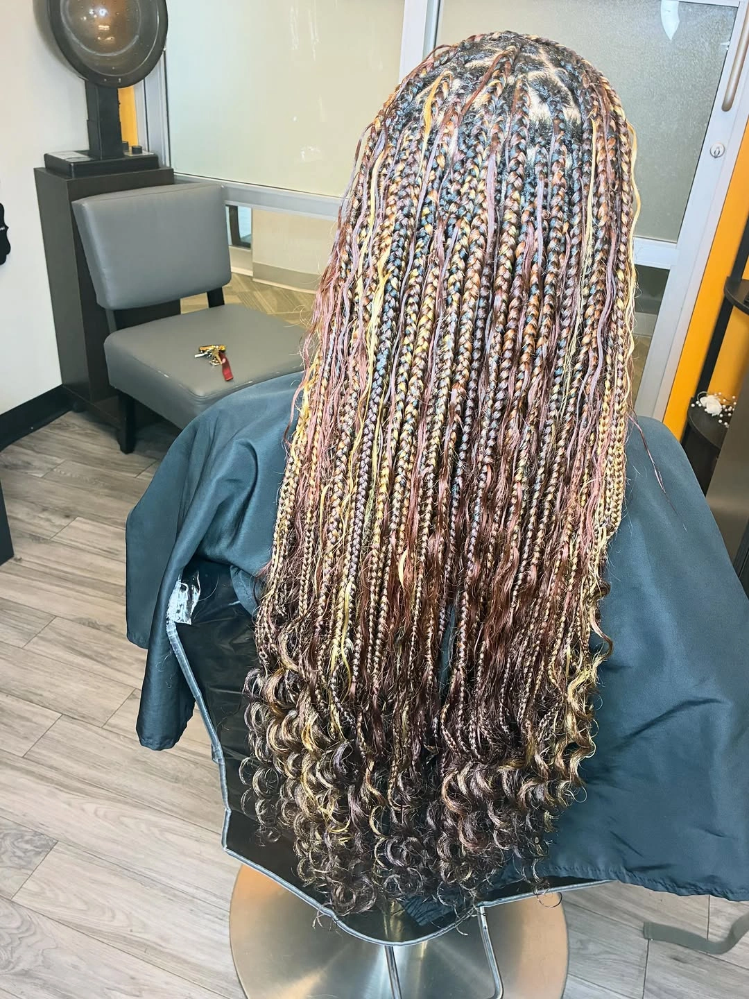 bora bora braids hairstyle Mixed Highlight Braids with Soft Curly Ends