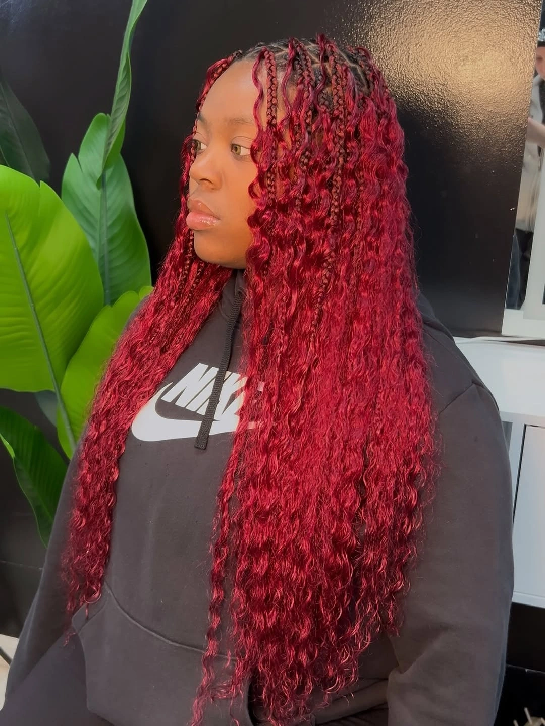 bora bora braids hairstyle Bold Ruby Red Curls for a Statement Finish