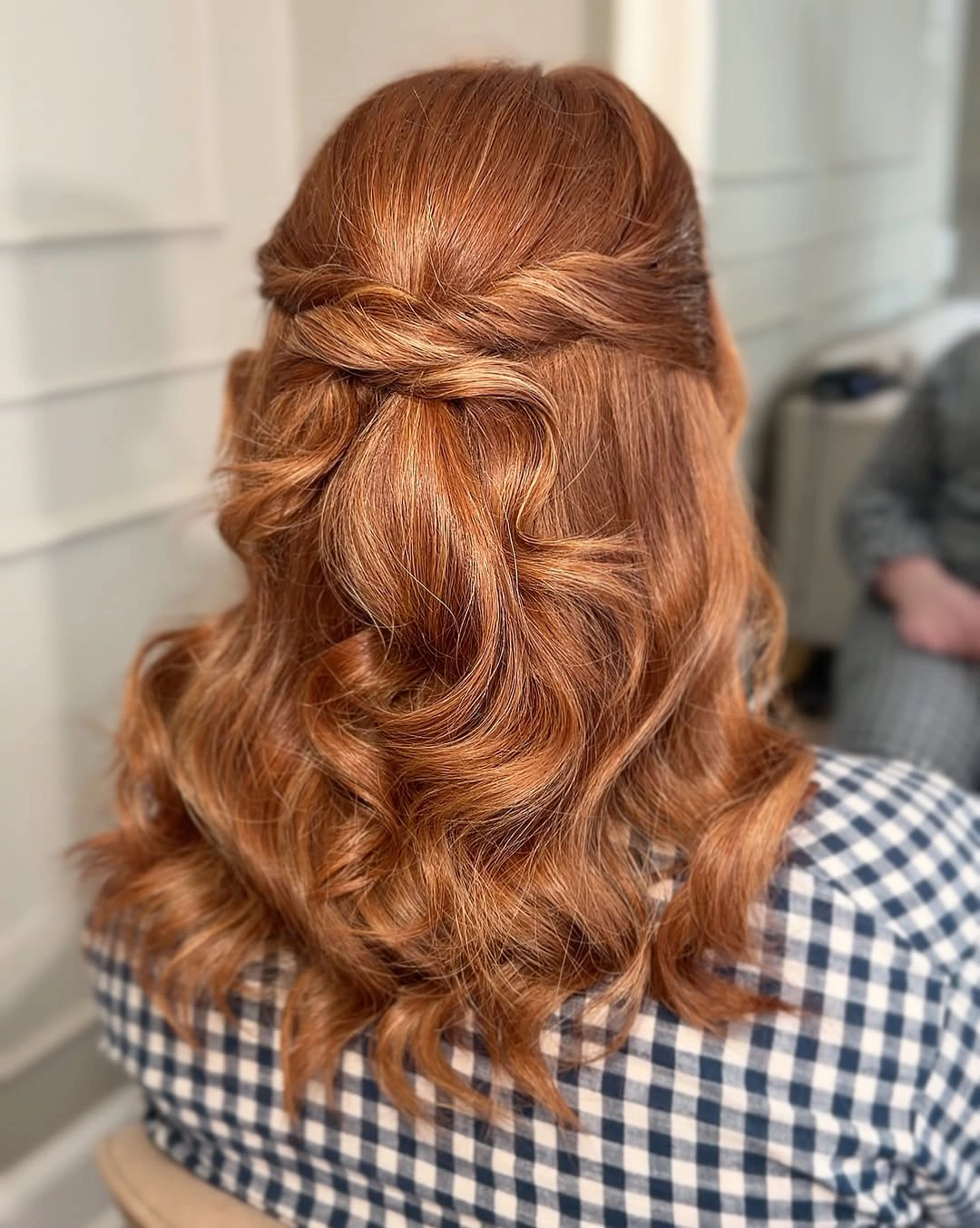 bridesmaid hairstyling Twisted Half-Up Waves with Warm Copper Dimension