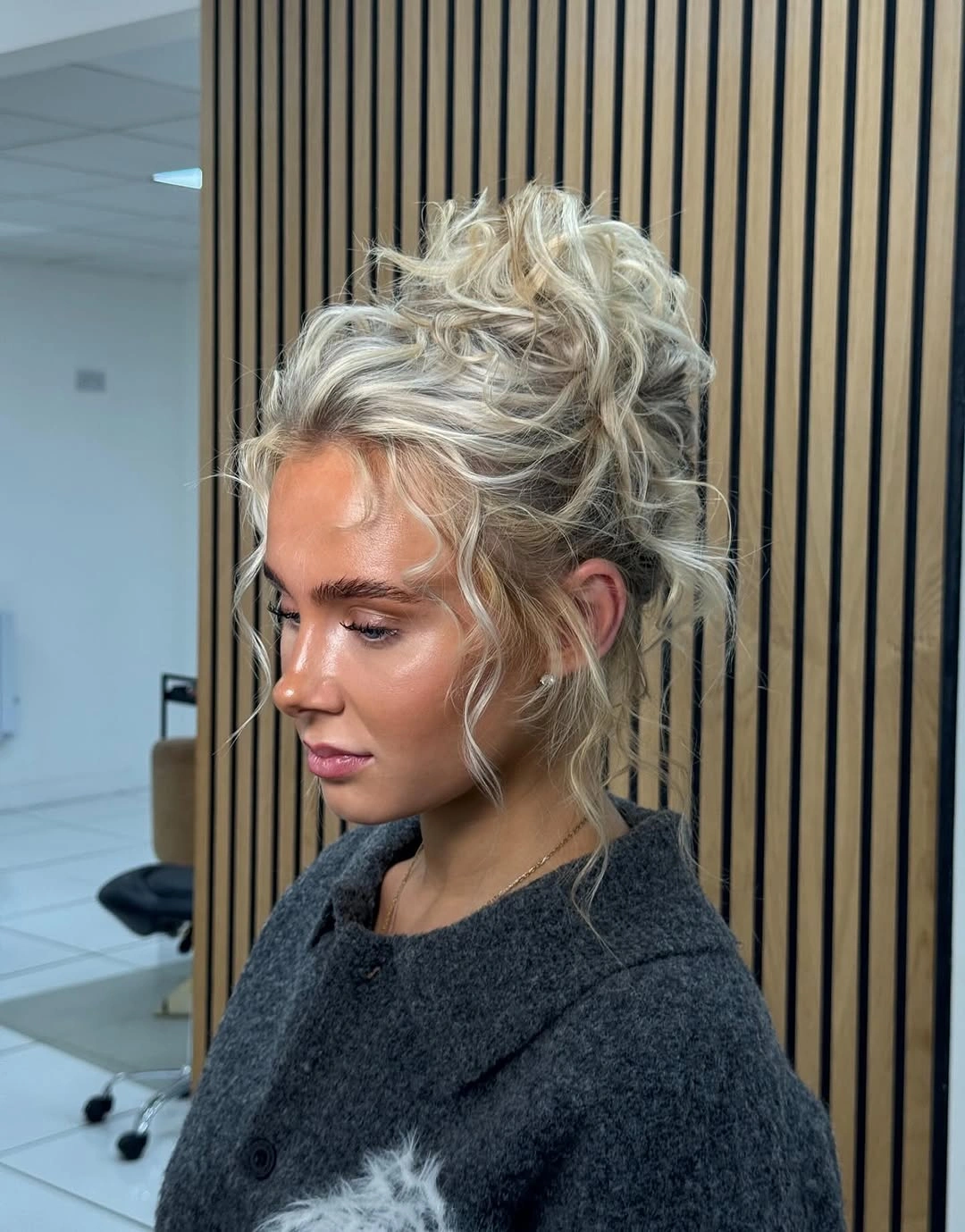 bridesmaid hairstyling Relaxed Textured Updo with Soft Blonde Movement