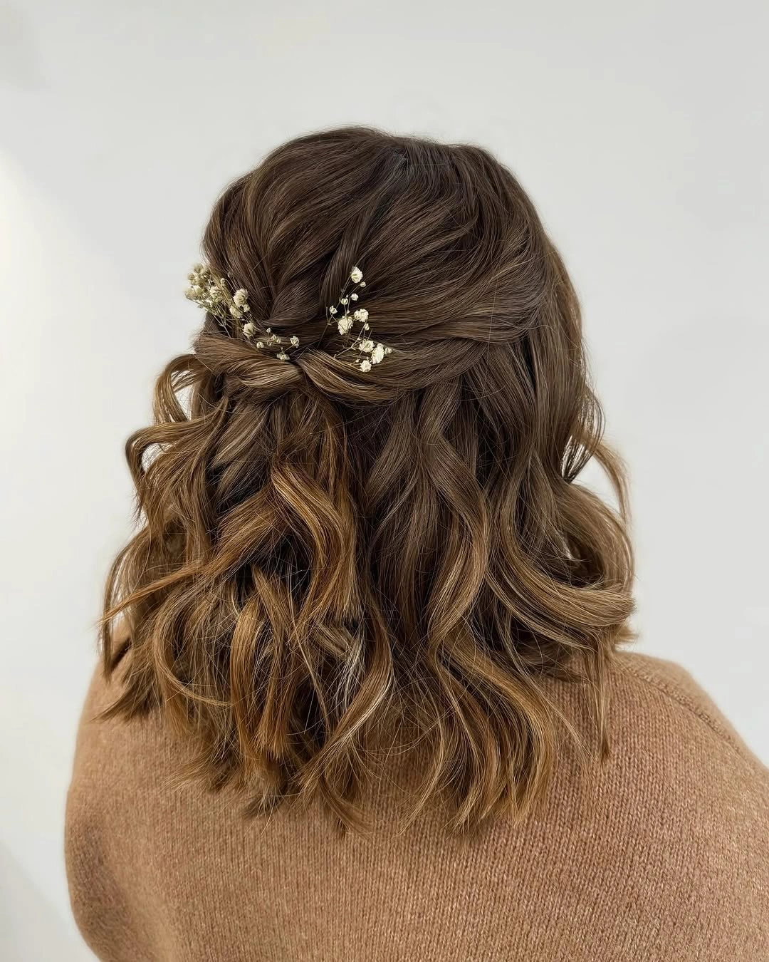 bridesmaid hairstyling Soft Twisted Waves for Effortless Medium-Length Elegance