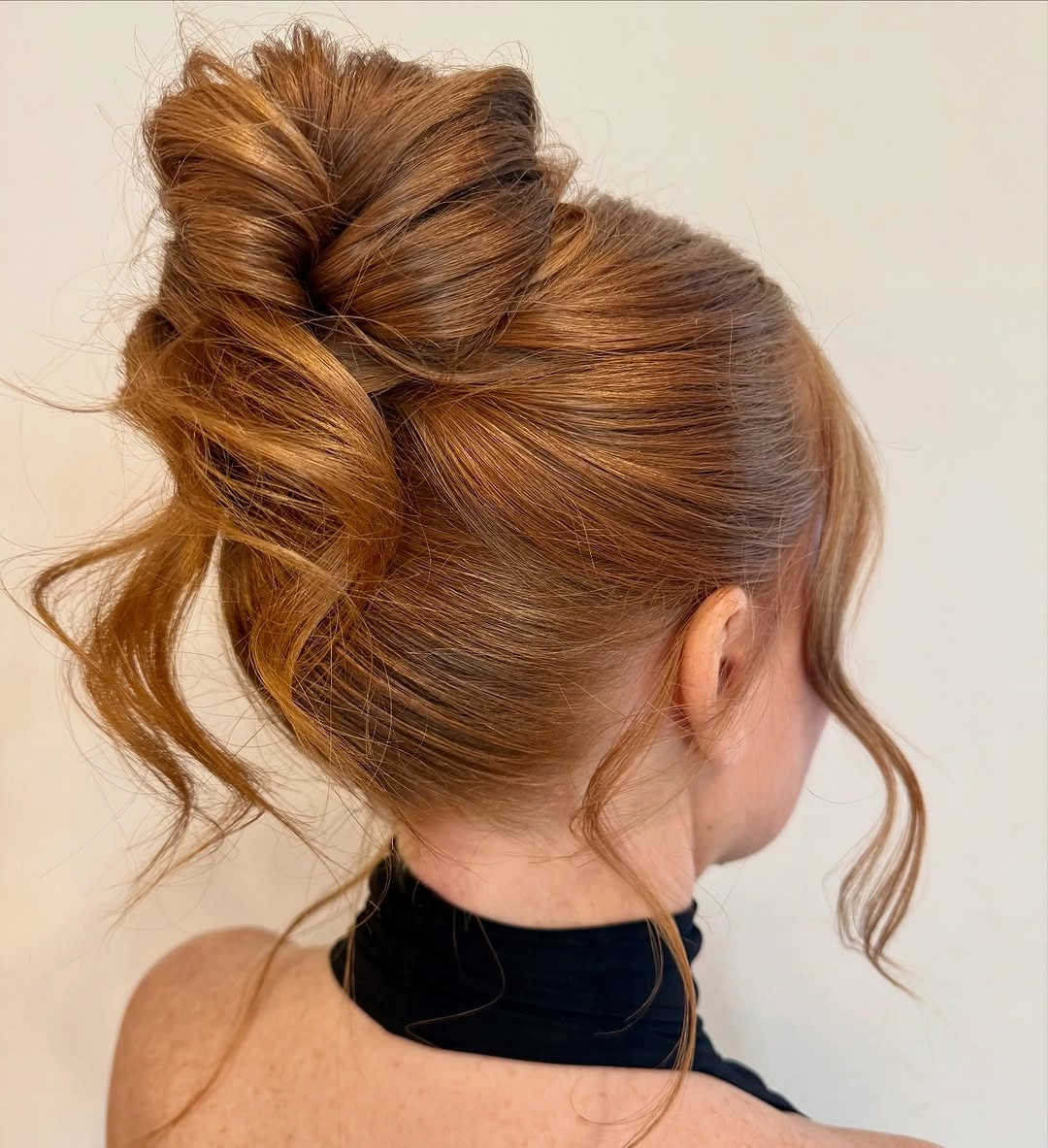 bridesmaid hairstyling Statement Bow Bun That Turns Into the Perfect Conversation Starter