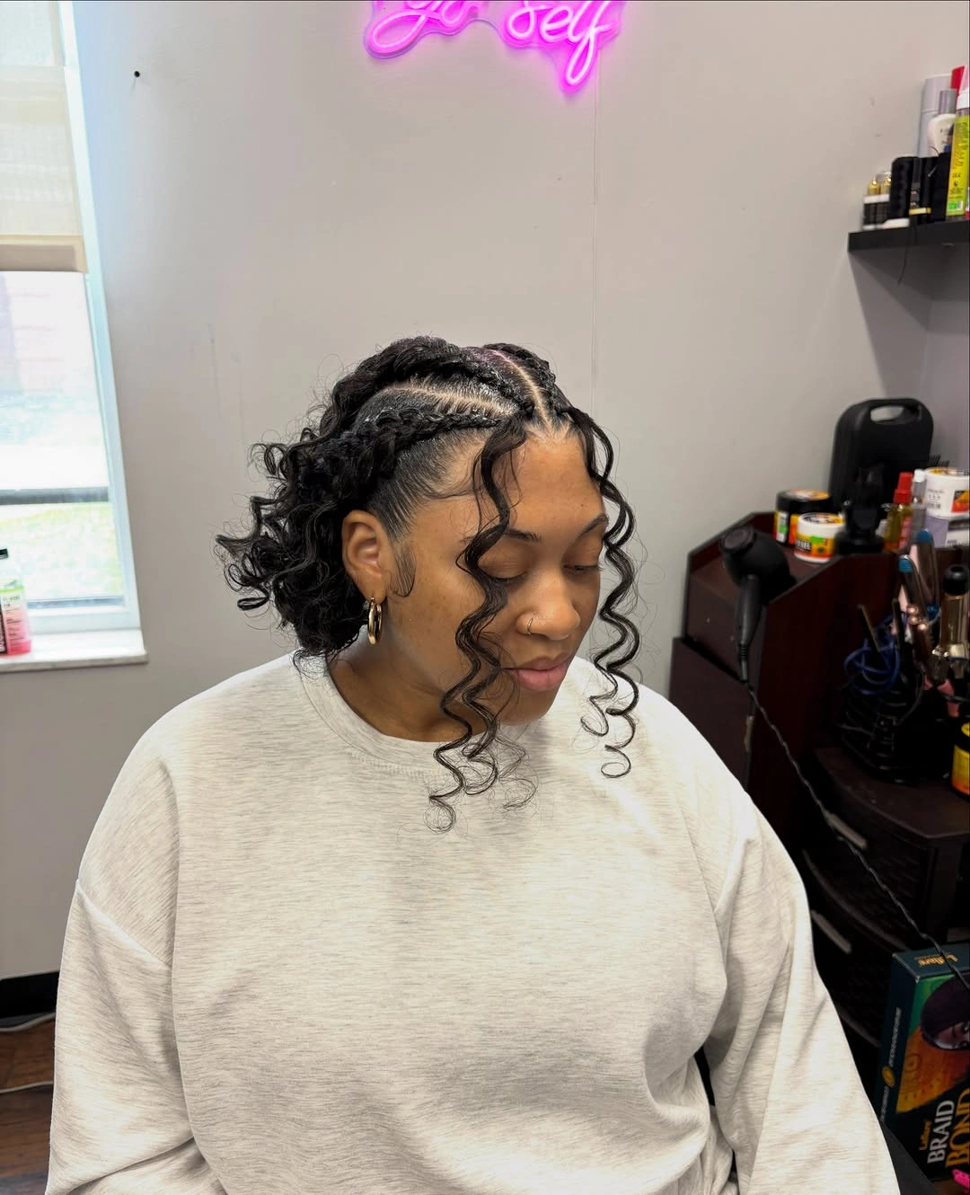 butterfly braids hairstyle Curly Butterfly Braids Gathered into a Soft Low Ponytail