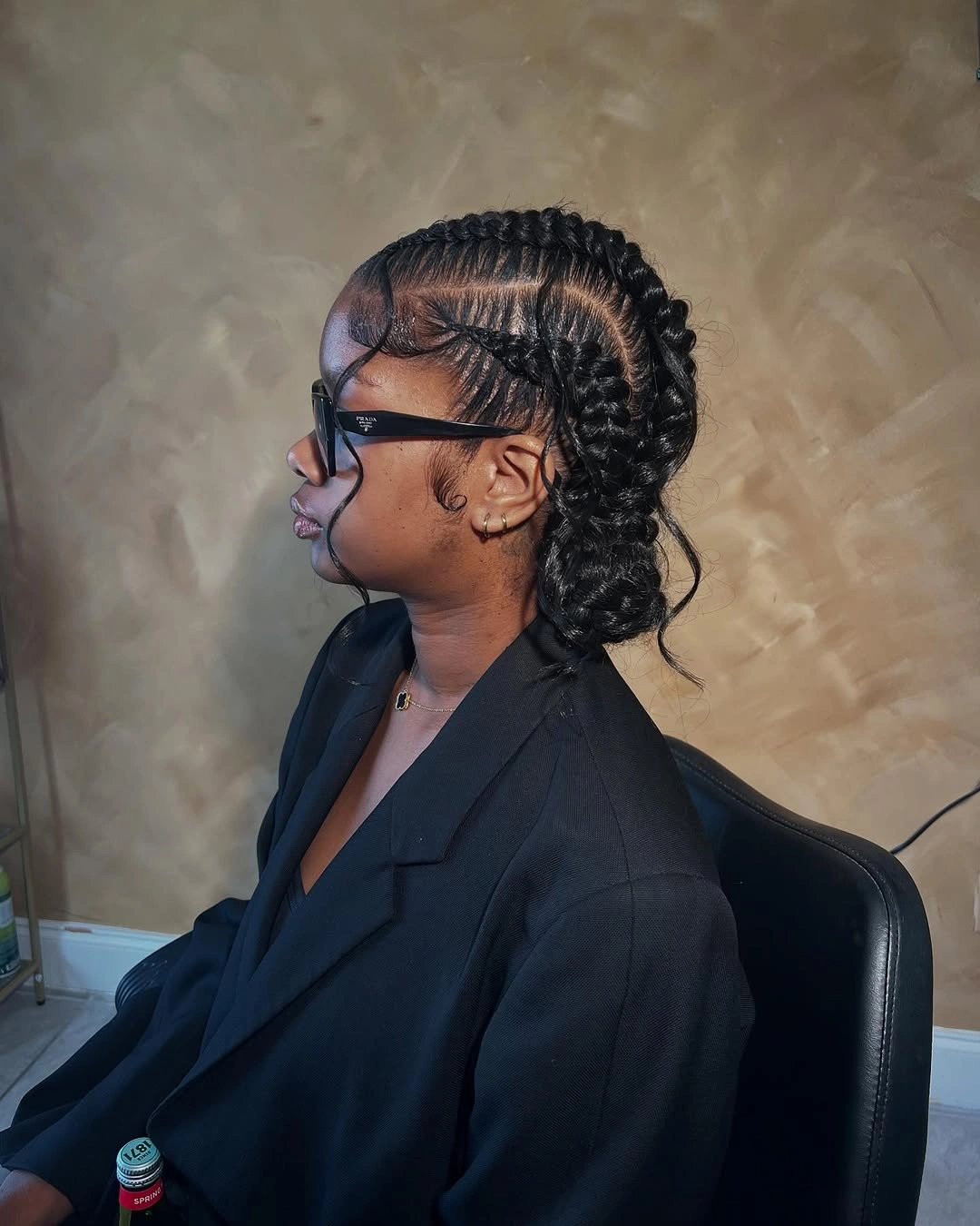 butterfly braids hairstyle Classic Butterfly Braids Styled into a Sleek Protective Bun