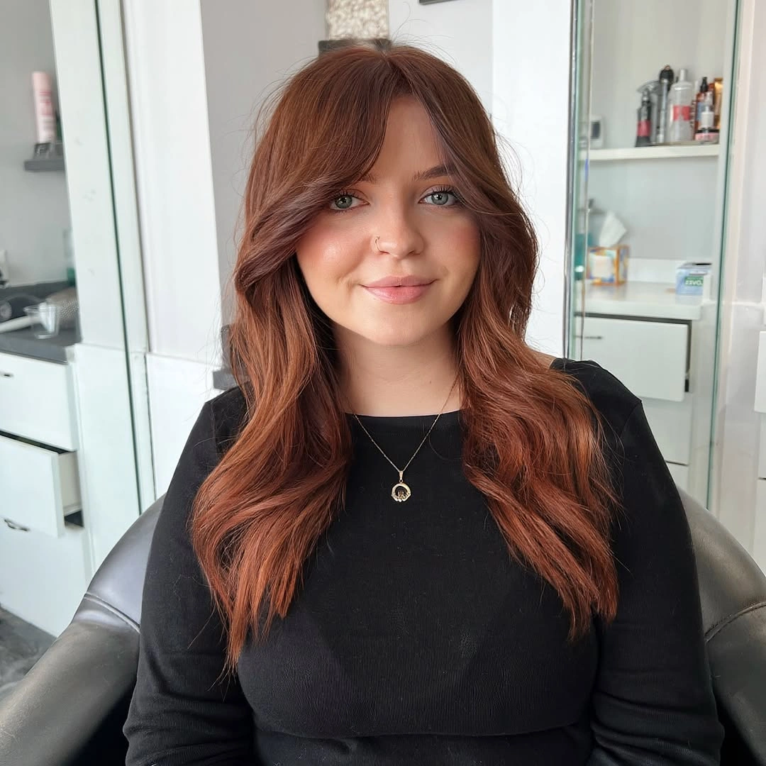 chestnut brown hair color Medium Copper Chestnut Waves With Curtain Bangs