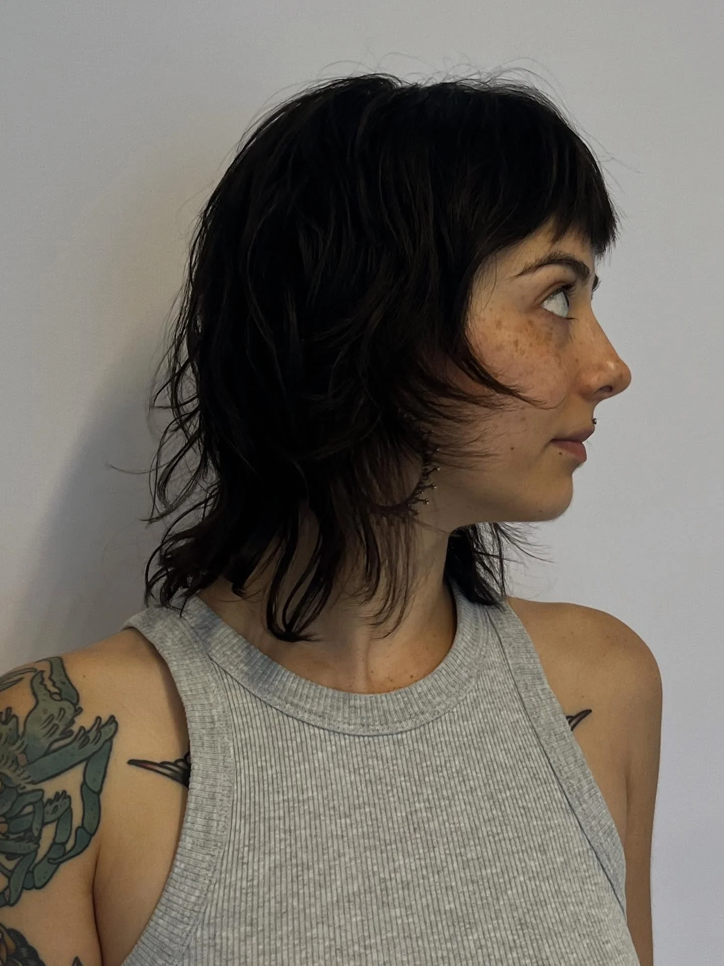 choppy medium layered hair Soft Feathered Bob With Subtle Shag Influence