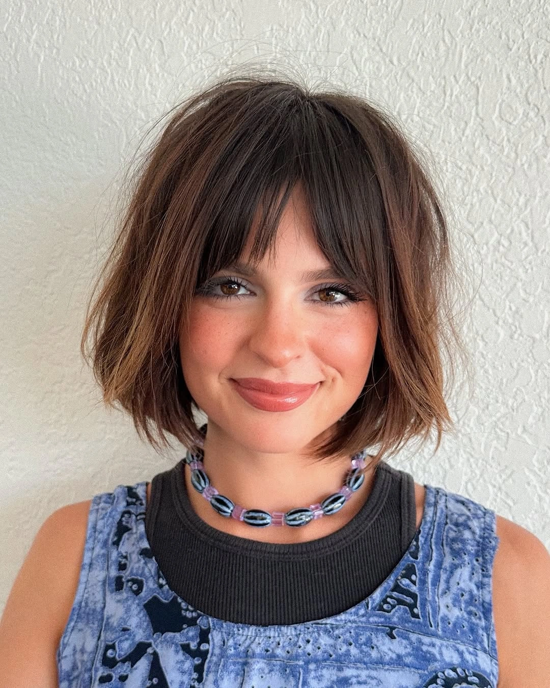 choppy medium layered hair French-Inspired Bob With Feathered Texture