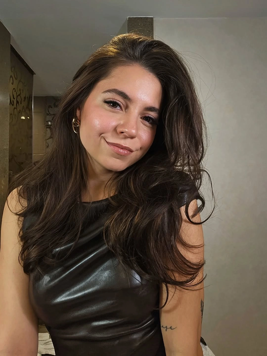 dimensional brunette hair color Dark Tousled Brunette Layers With Side Volume