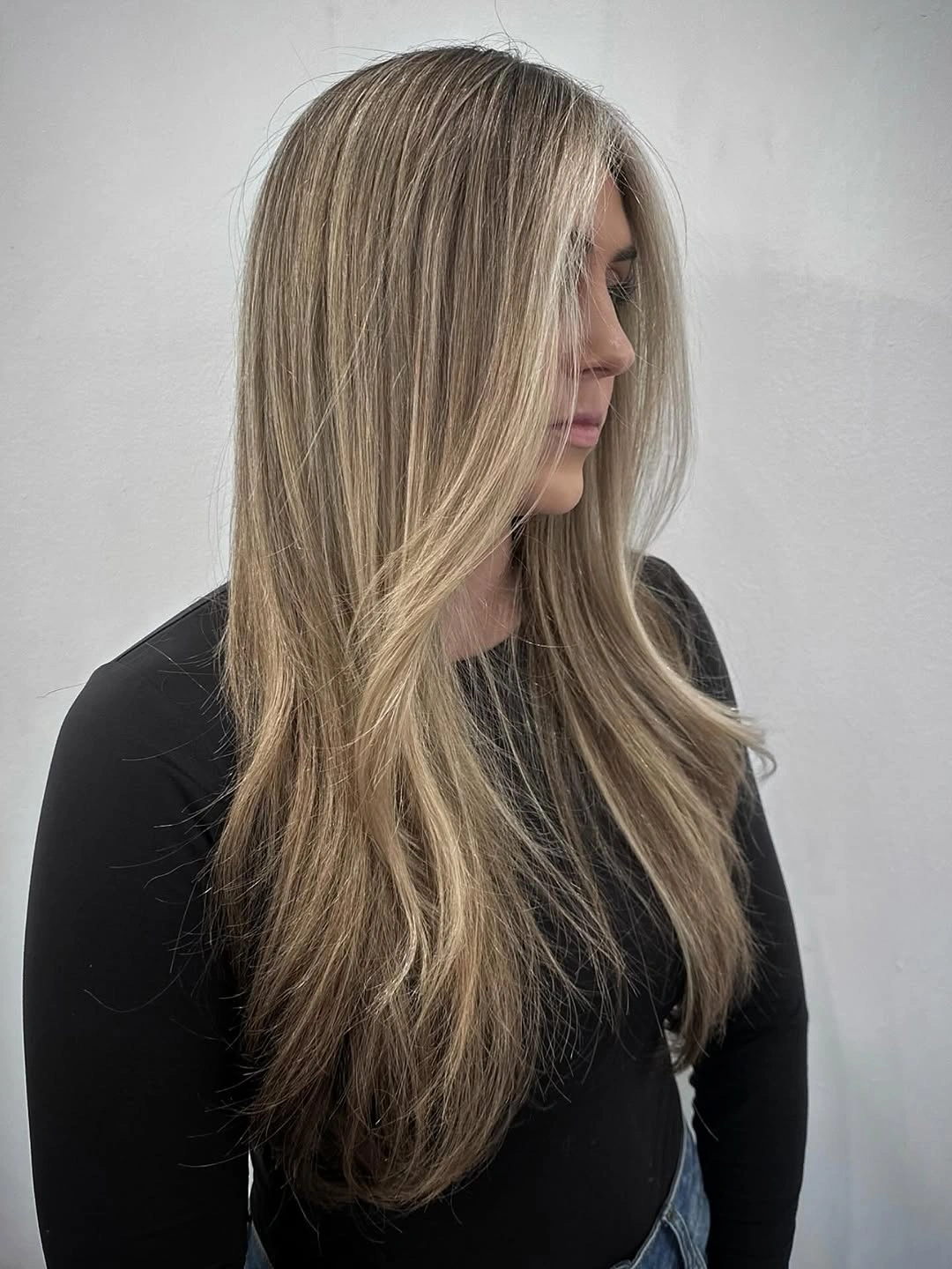 dirty blonde hair color Soft Layered Dirty Blonde with Creamy Face-Framing Brightness
