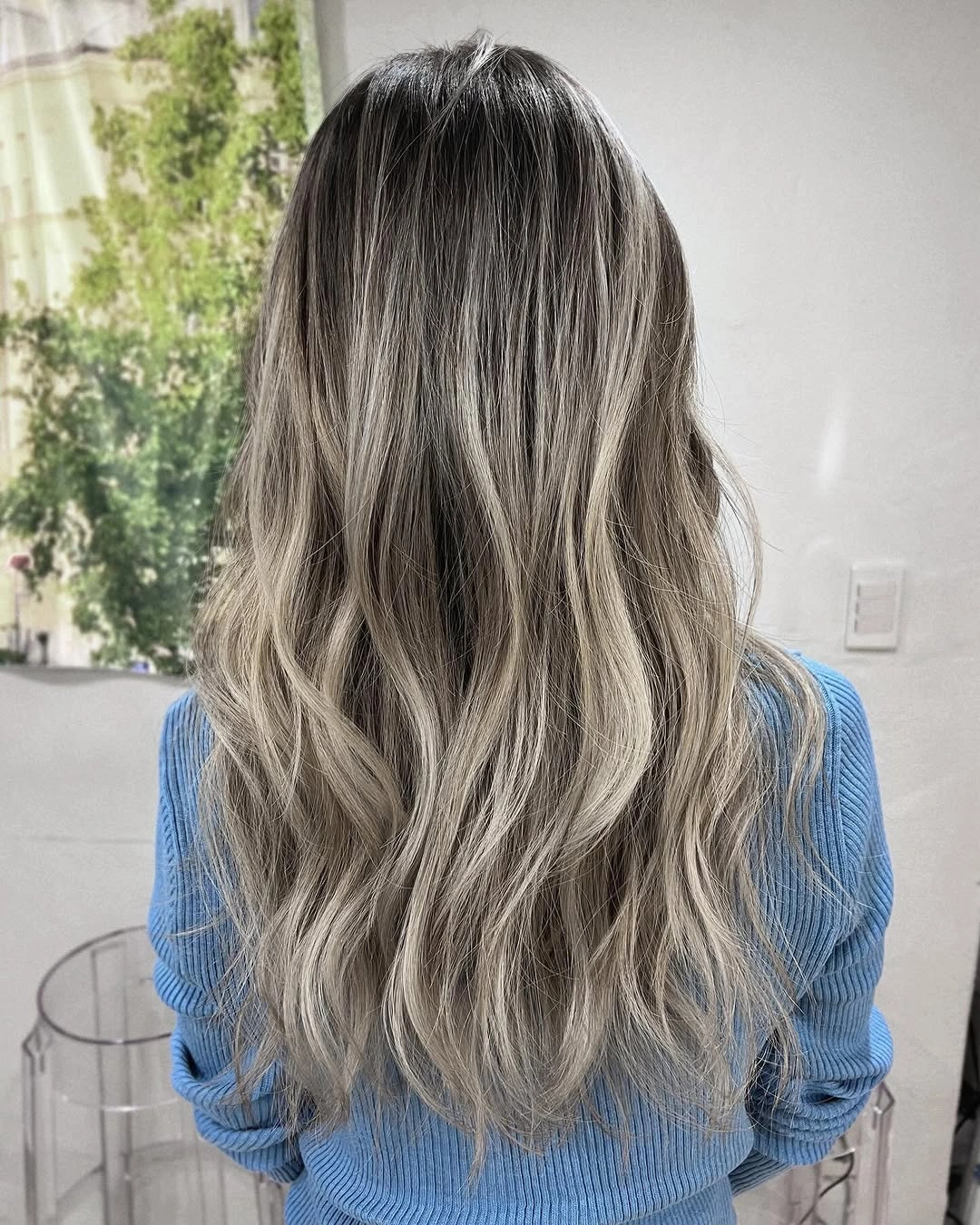 dirty blonde hair color Smoky Dirty Blonde Balayage with Soft Cool Waves