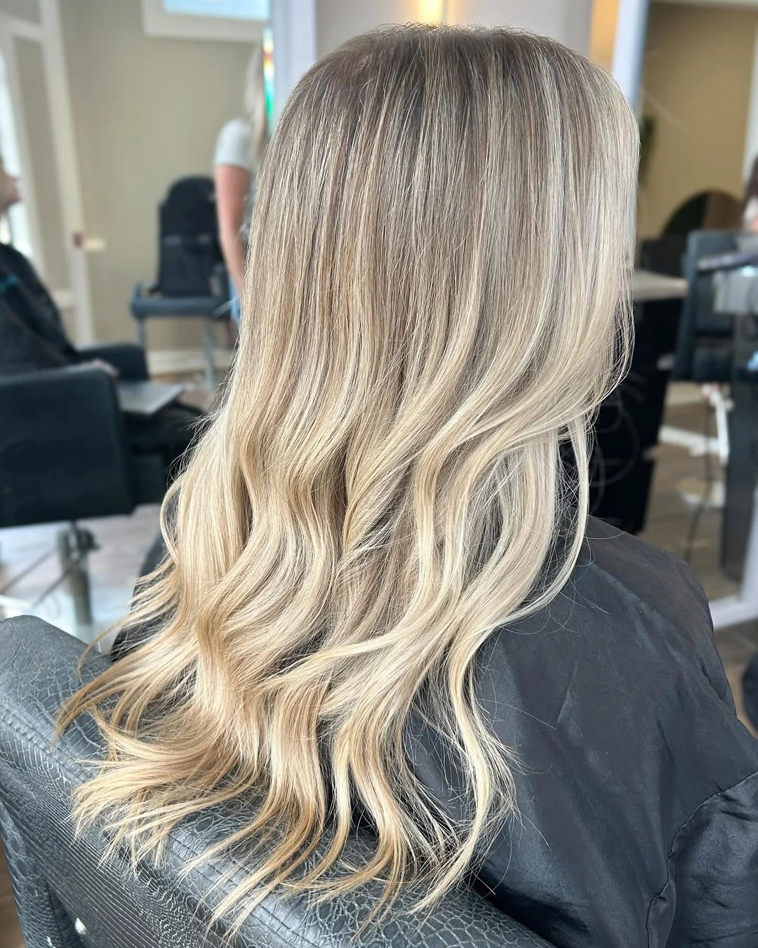 dirty blonde hair color Seamless Dirty Blonde Balayage with Creamy Waves