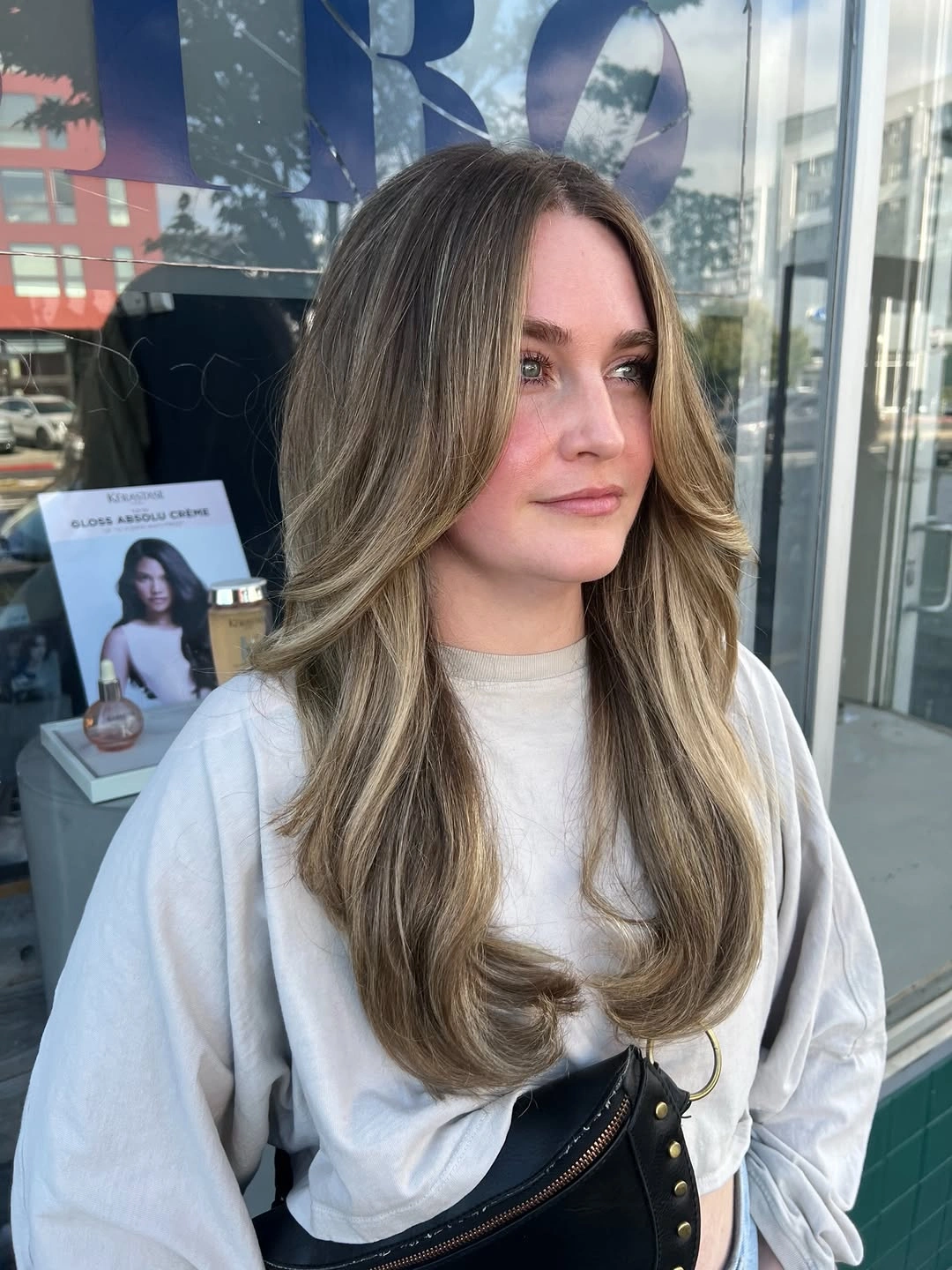 dirty blonde hair color Smoky Dirty Blonde Blowout with Luxurious Volume