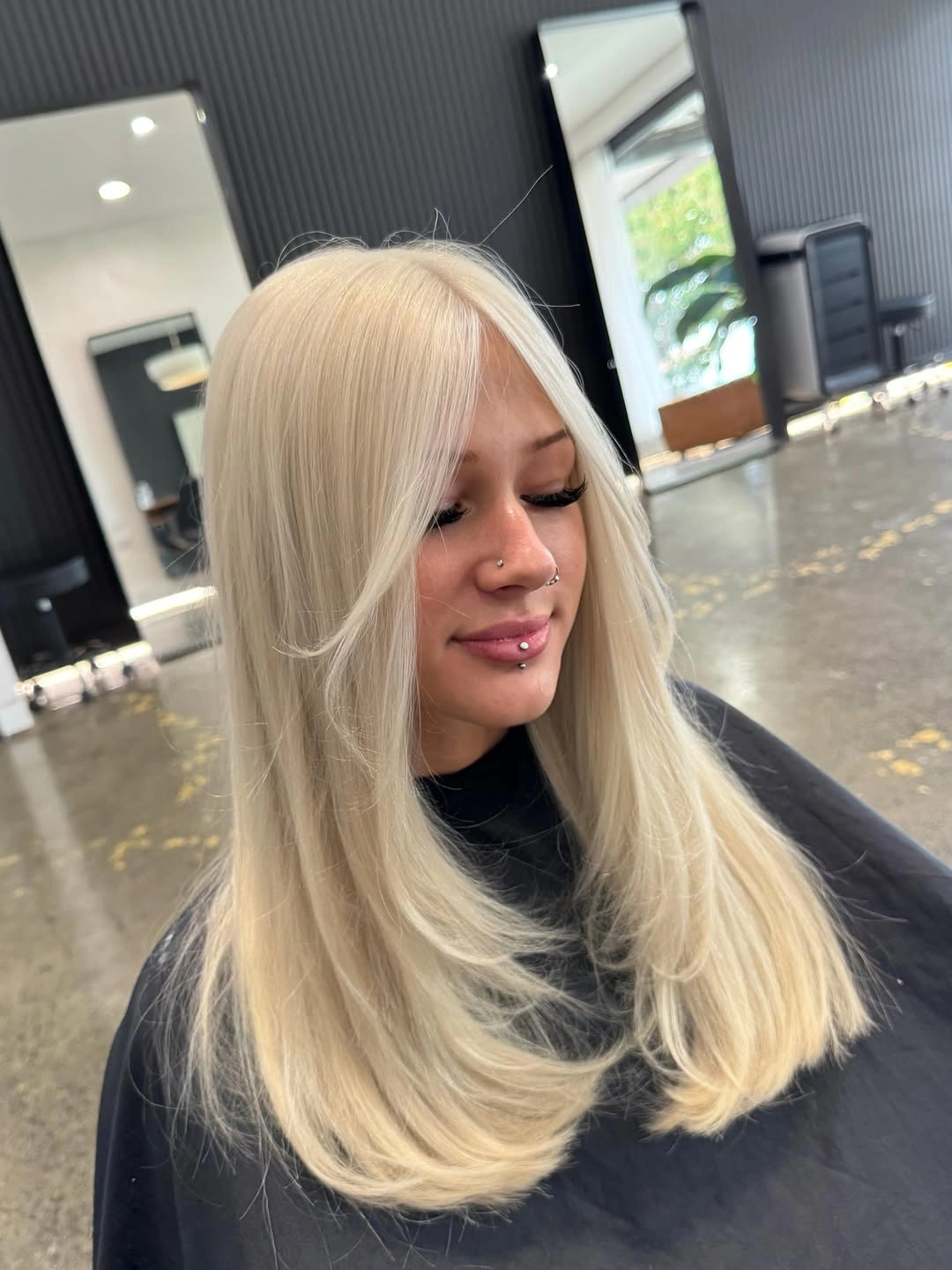 Fall blonde hair colour 2026 Classic Vanilla Blonde Blowout With Curtain Layers