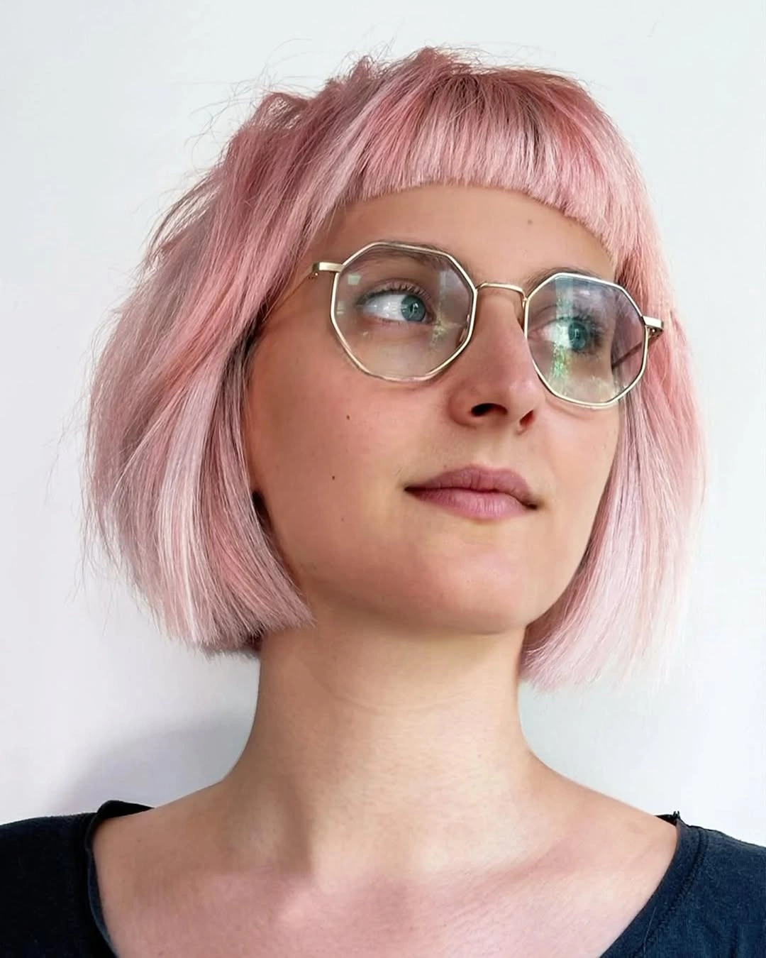 fall bob haircut ideas 2026 Playful Pastel Pink Bob With Graphic Micro Bangs