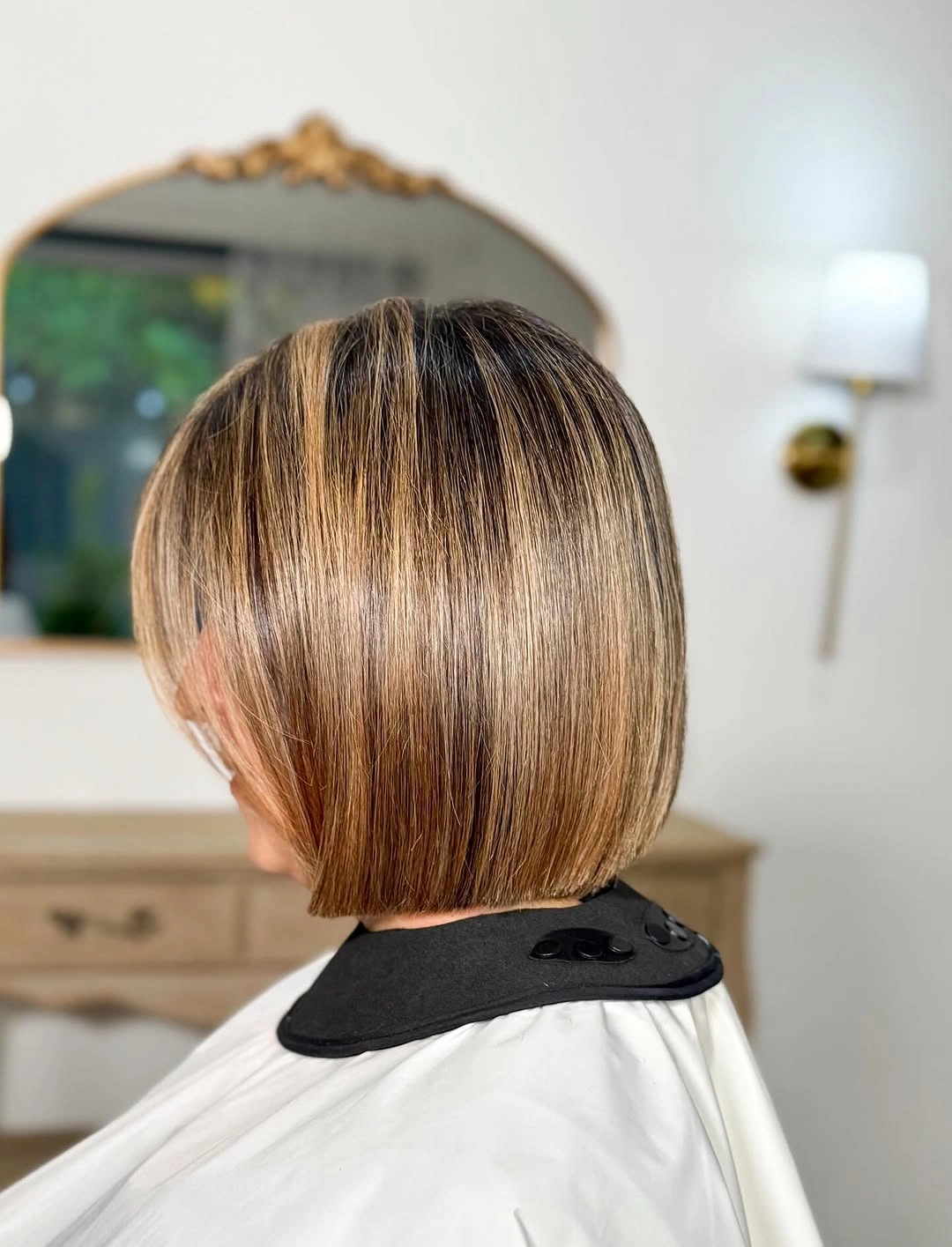 fall bob haircut ideas 2026 Champagne Blonde Glass Bob With Luxury Dimension