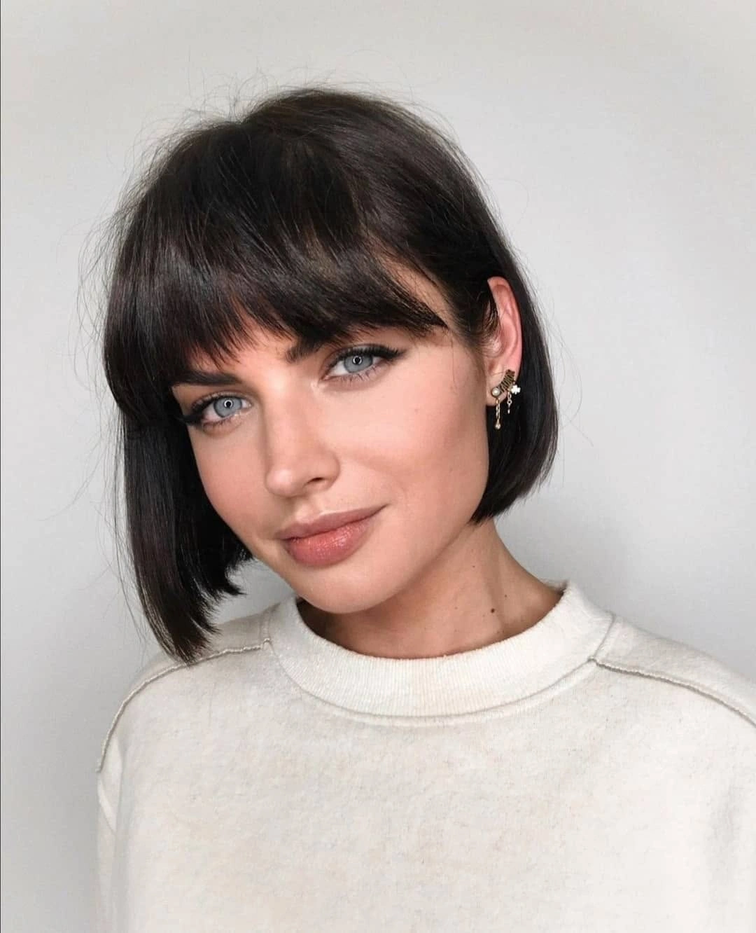 fall bob haircut ideas 2026 French-Inspired Dark Bob With Feathered Bangs