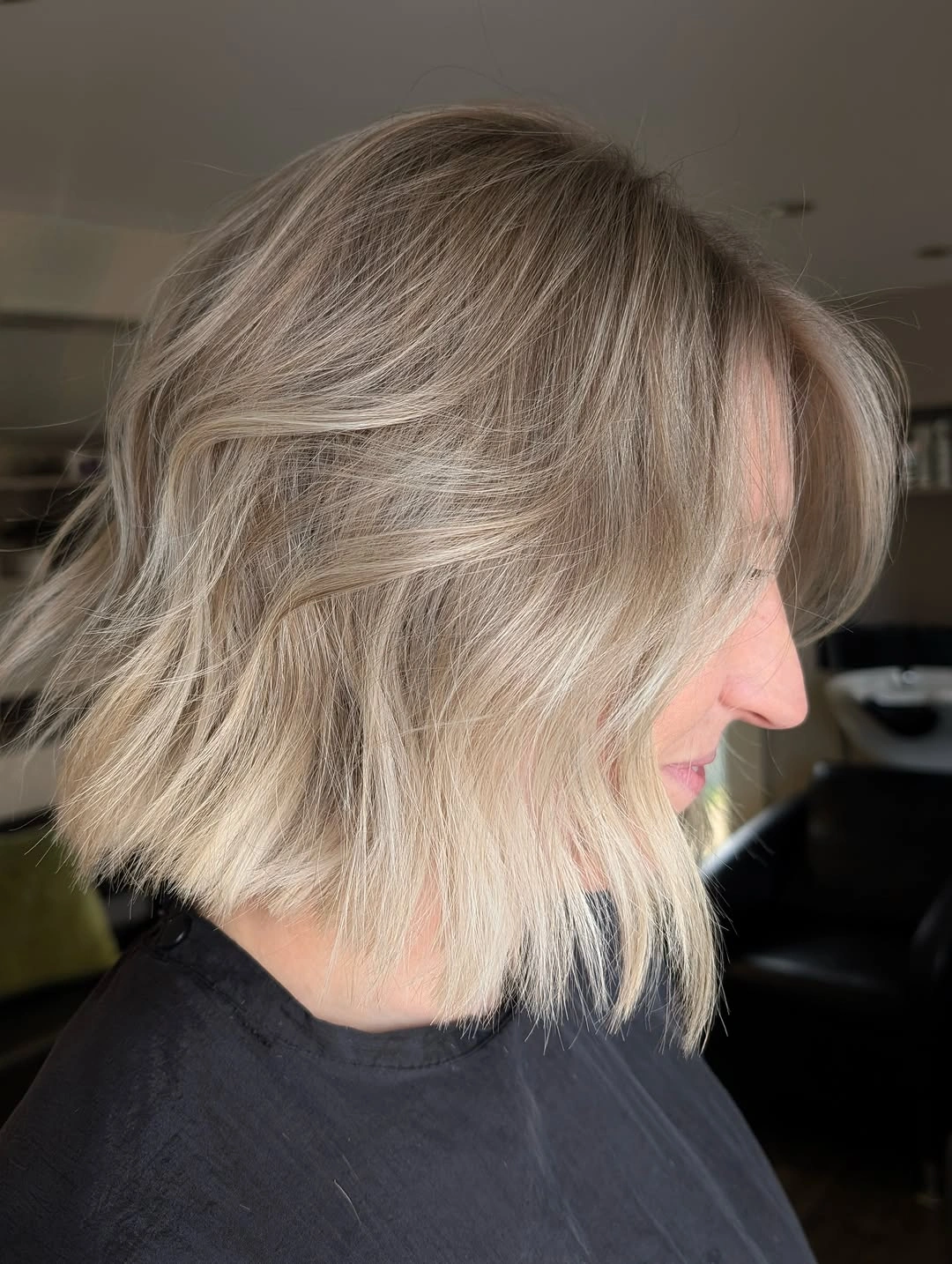 fall bob haircut ideas 2026 Textured Champagne Blonde Bob With Airy Layers