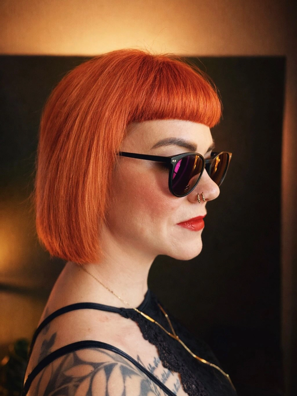 fall bob haircut ideas 2026 Bold Copper Bob With Graphic Micro Bangs