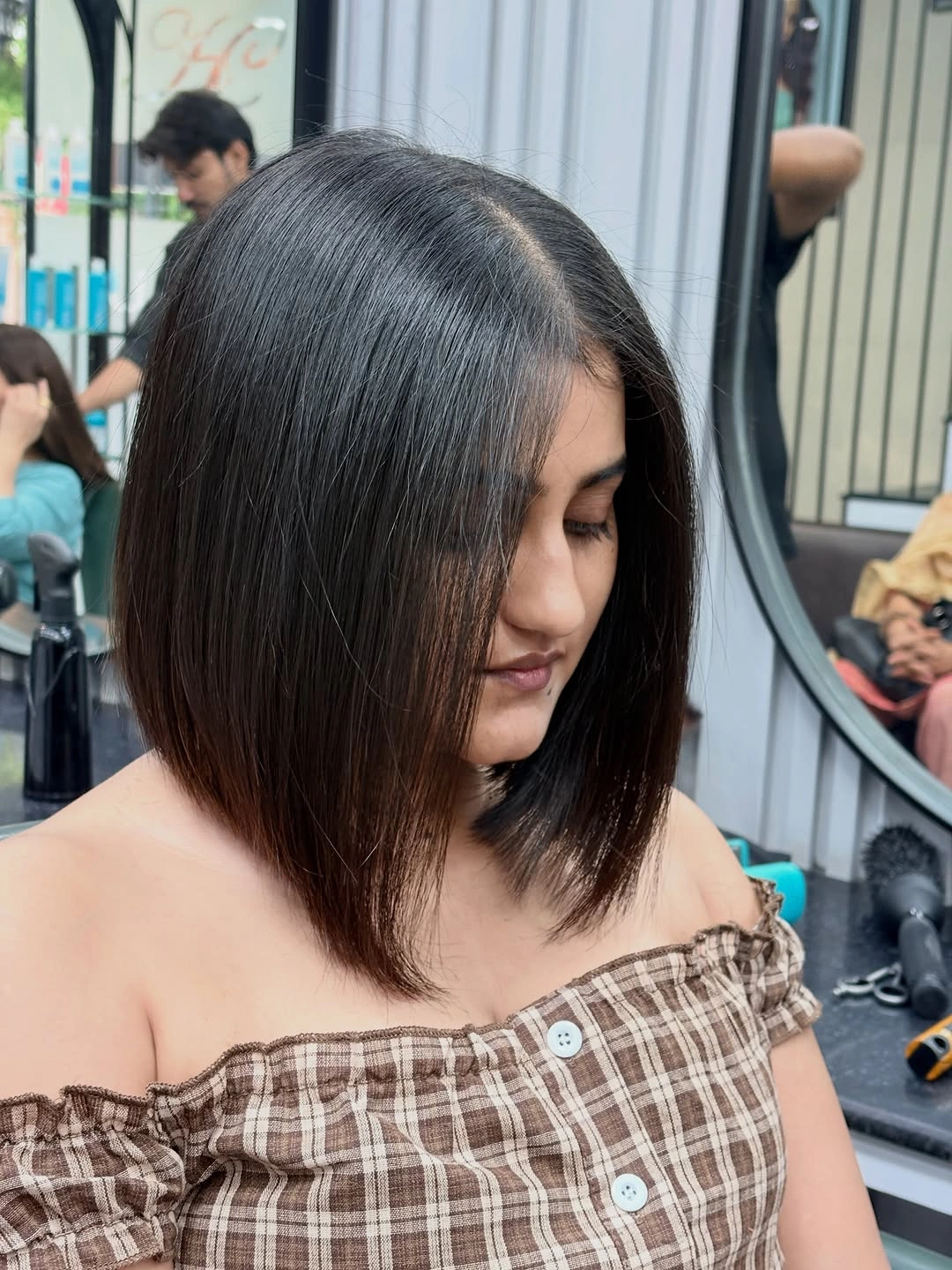 fall bob haircut ideas 2026 Soft Angled Brunette Bob With Natural Shine