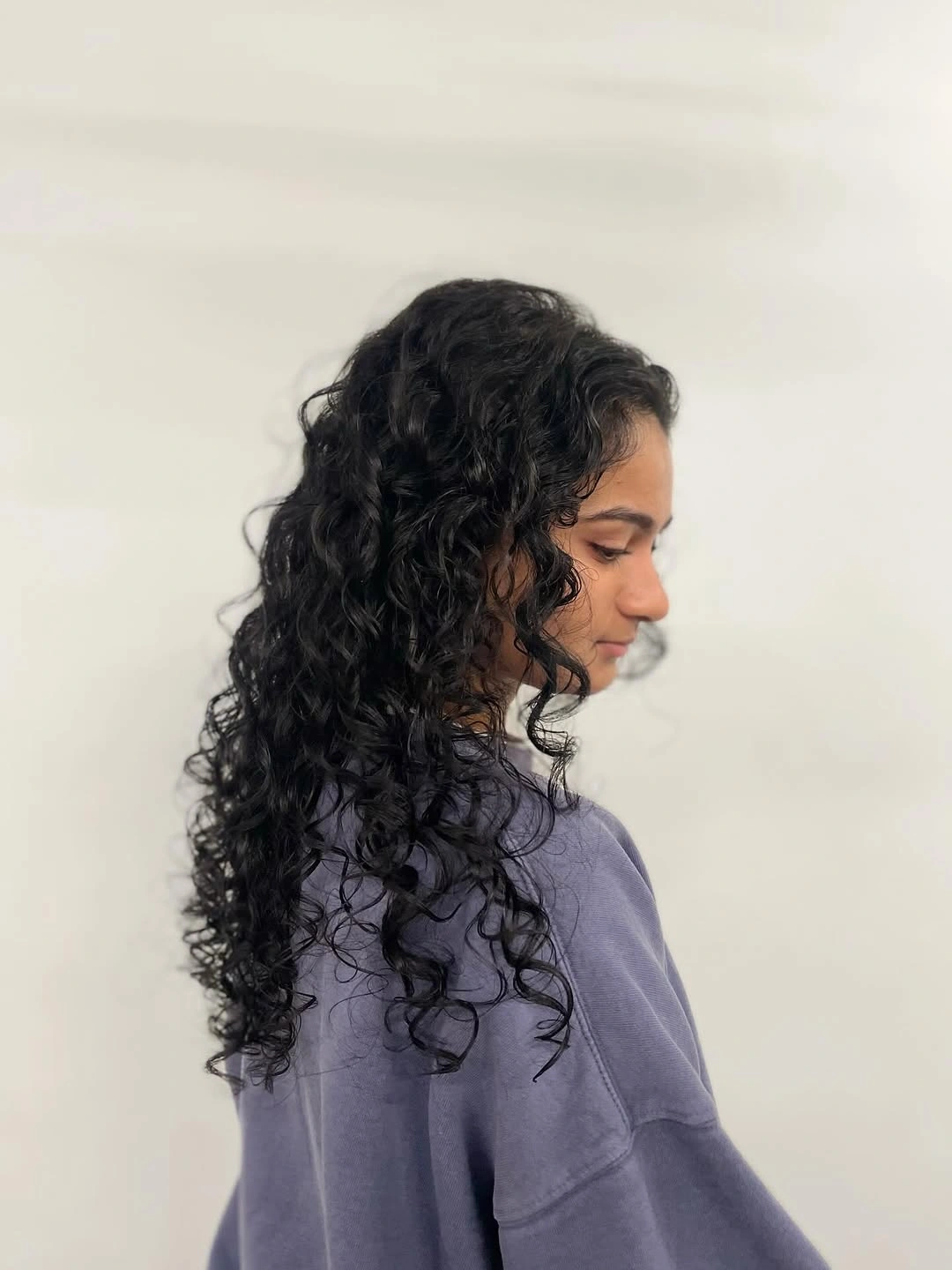 fall brunette hair colour 2026 Rich Espresso Curls With Incredible Natural Dimension