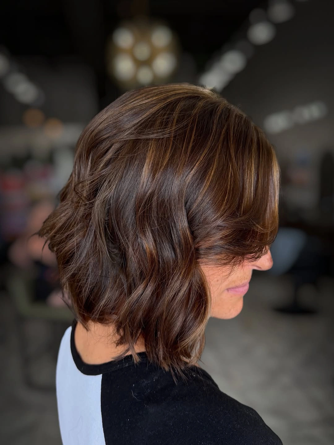 fall brunette hair colour 2026 Chocolate Wavy Bob With Caramel Dimension