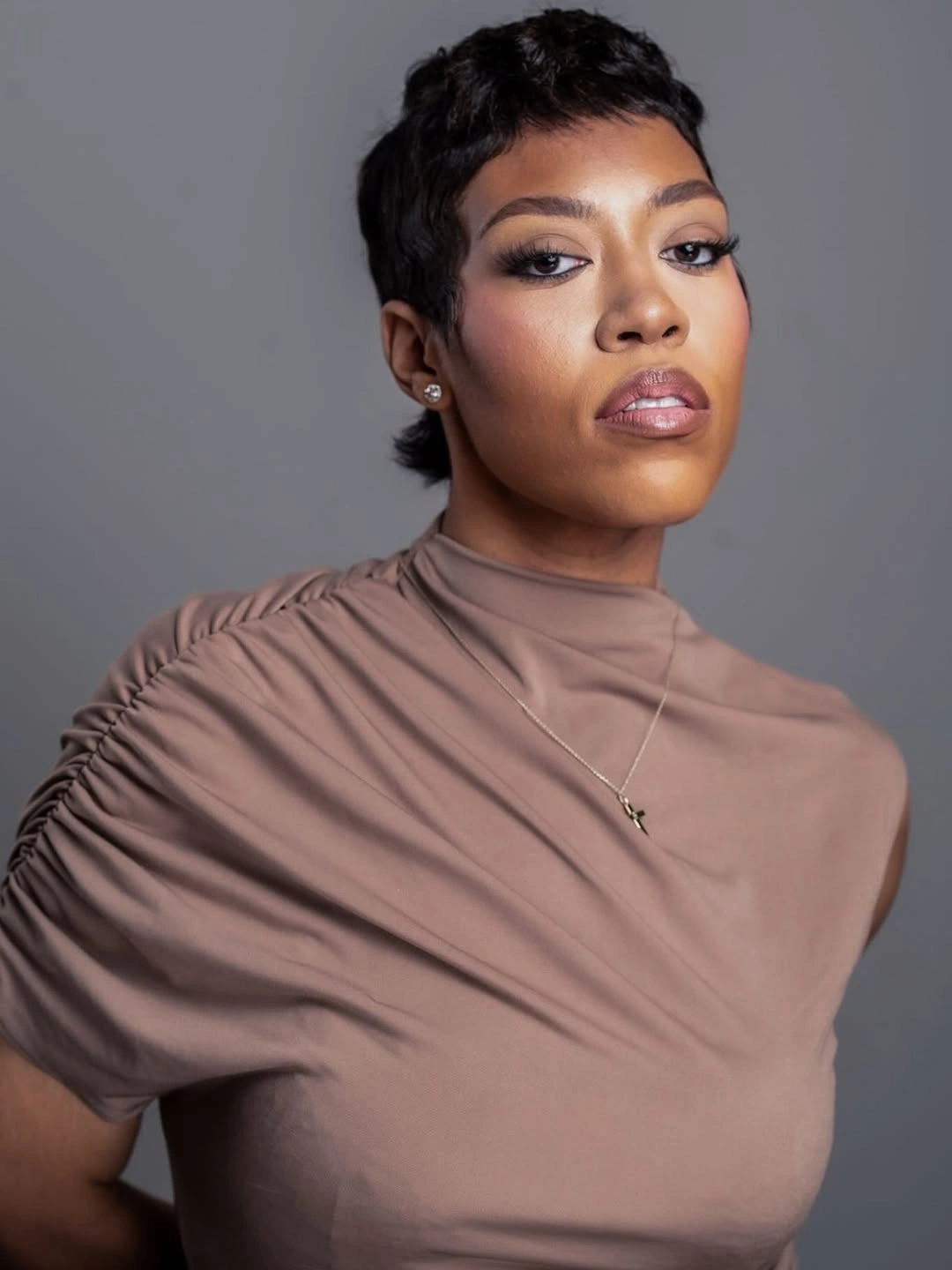 fall hair colors for black women 2026 Soft Espresso Pixie with a Modern Edge