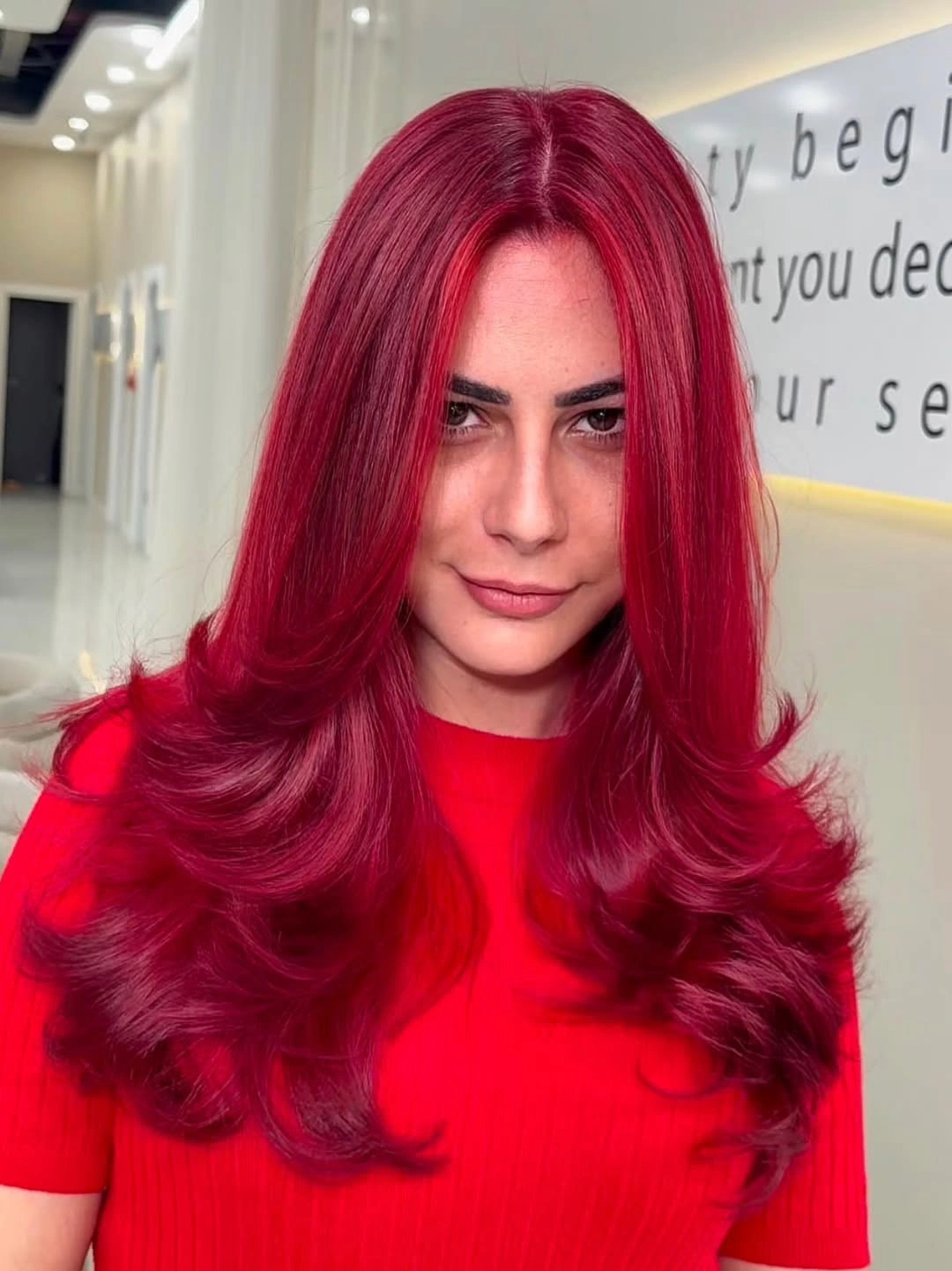 fall hair colour ideas 2026 Glossy Cherry Red With Soft Layers