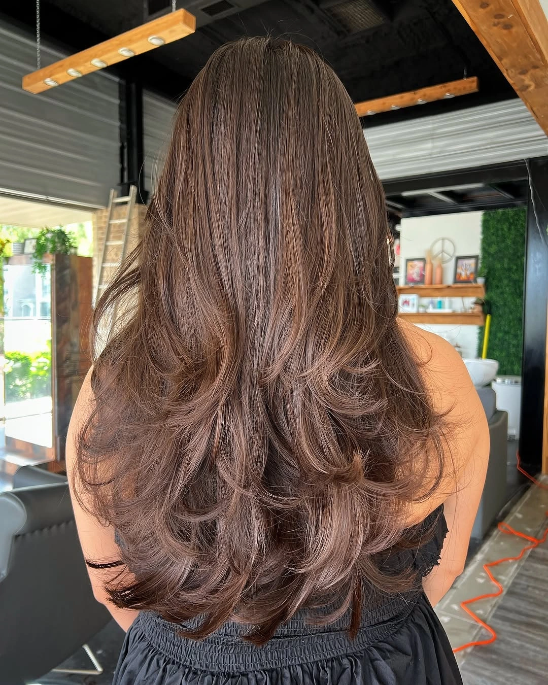 fall haircuts for women 2026 Luxury Long Layers with a Soft Chocolate Finish