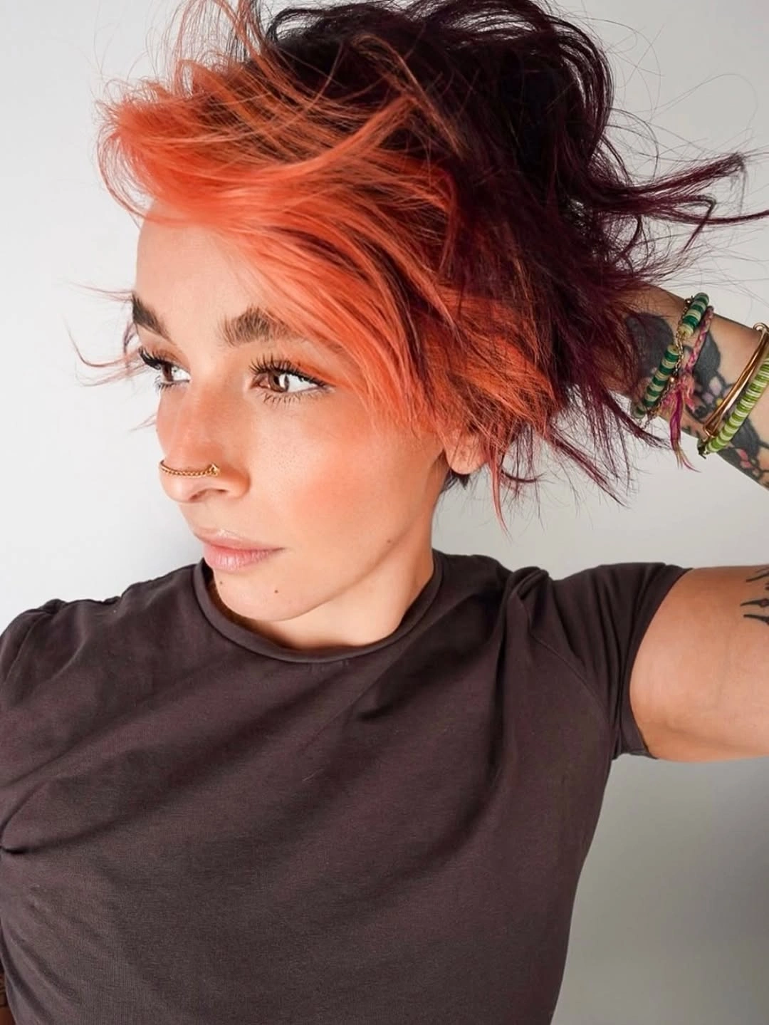 fall haircuts for women 2026 Bold Sunset Pixie with Creative Color Blocking