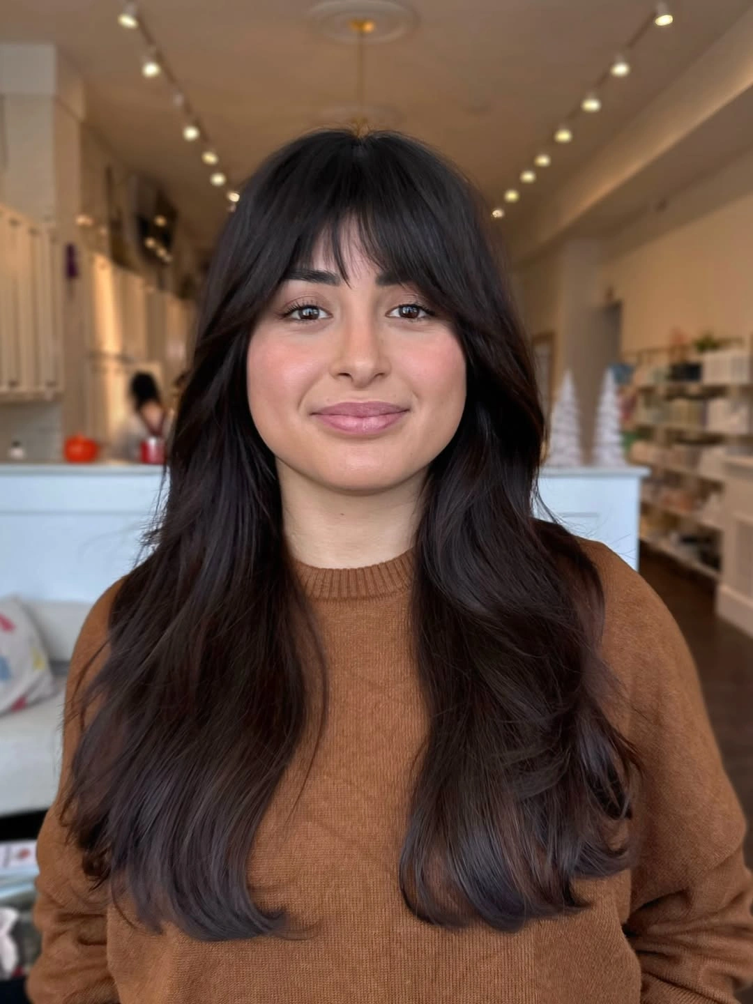 fall haircuts for women 2026 Long Espresso Layers with Airy Curtain Bangs