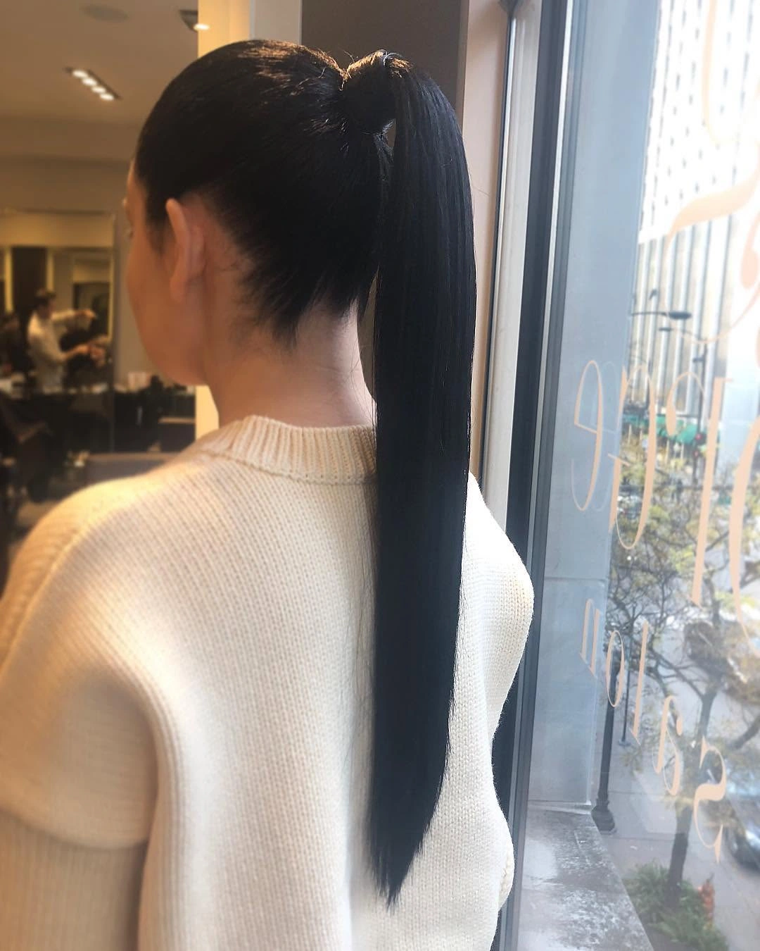 fall haircuts for women 2026 Sleek Glass Hair with a High Ponytail Twist