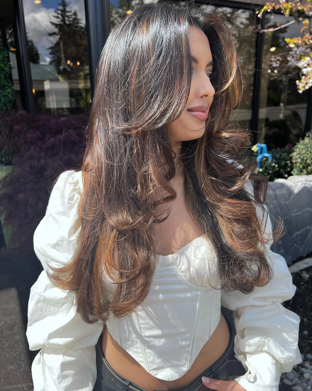 fall haircuts for women 2026 Voluminous Feathered Layers with Espresso Dimension