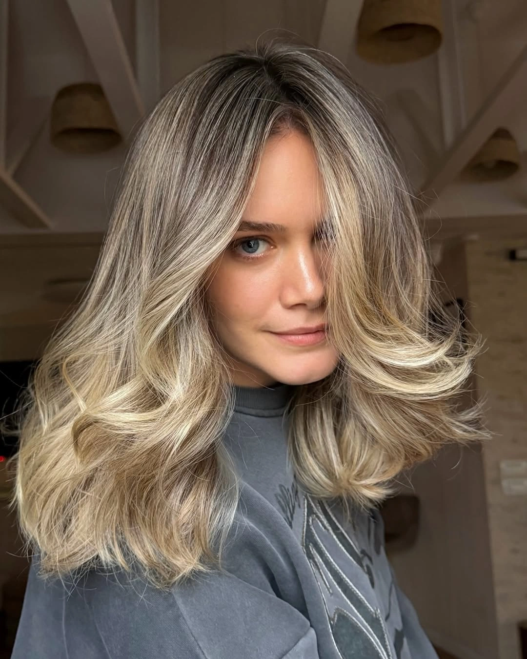 fall hairstyles 2026 Soft Scandinavian Blonde With Airy Face Framing Layers