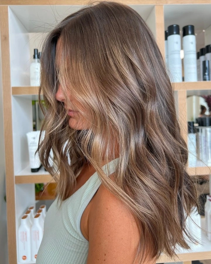 fall hairstyles for long hair 2026 Cool Beige Brunette with Soft Face-Framing Layers