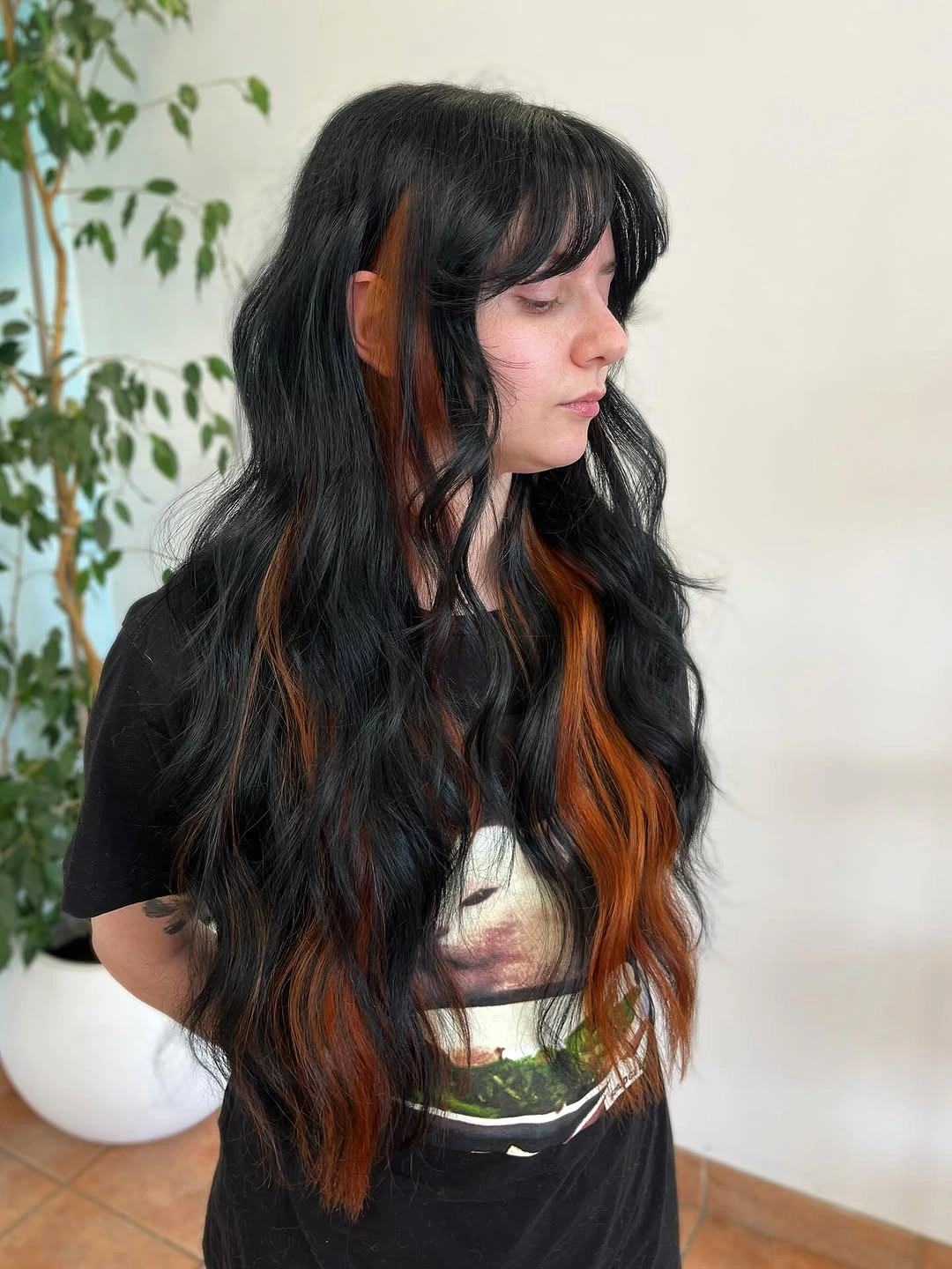 fall hairstyles for long hair 2026 Dark Romantic Waves with Copper Peekaboo Highlights