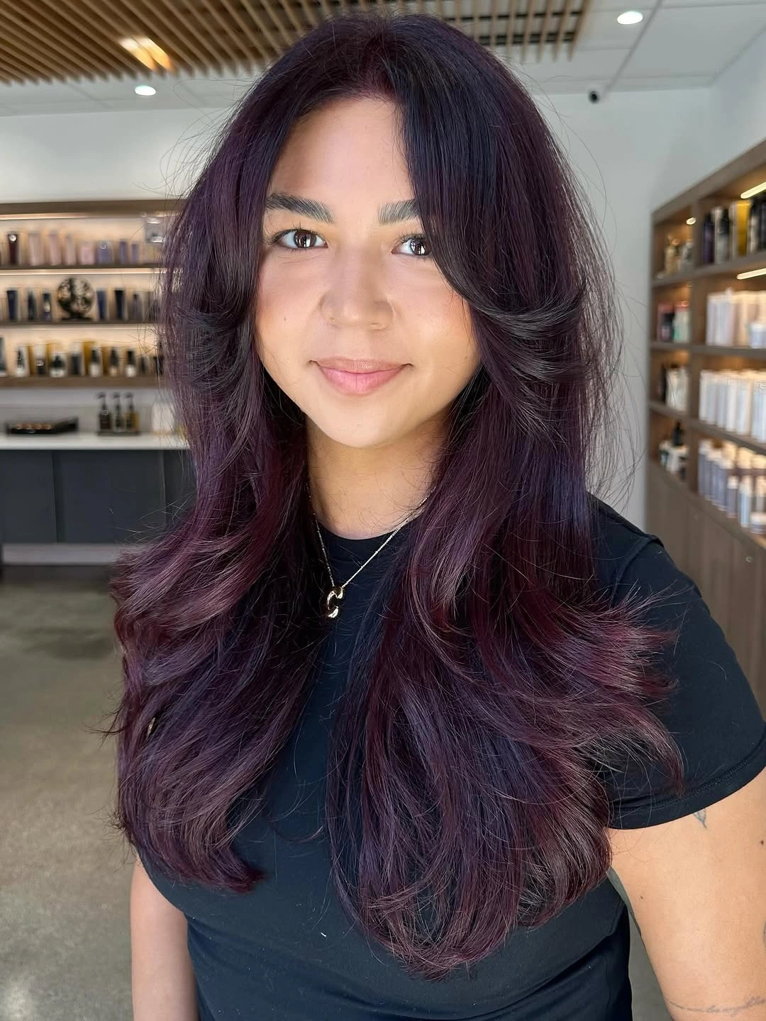 fall hairstyles for long hair 2026 Deep Plum Layers with a Luxurious Blowout