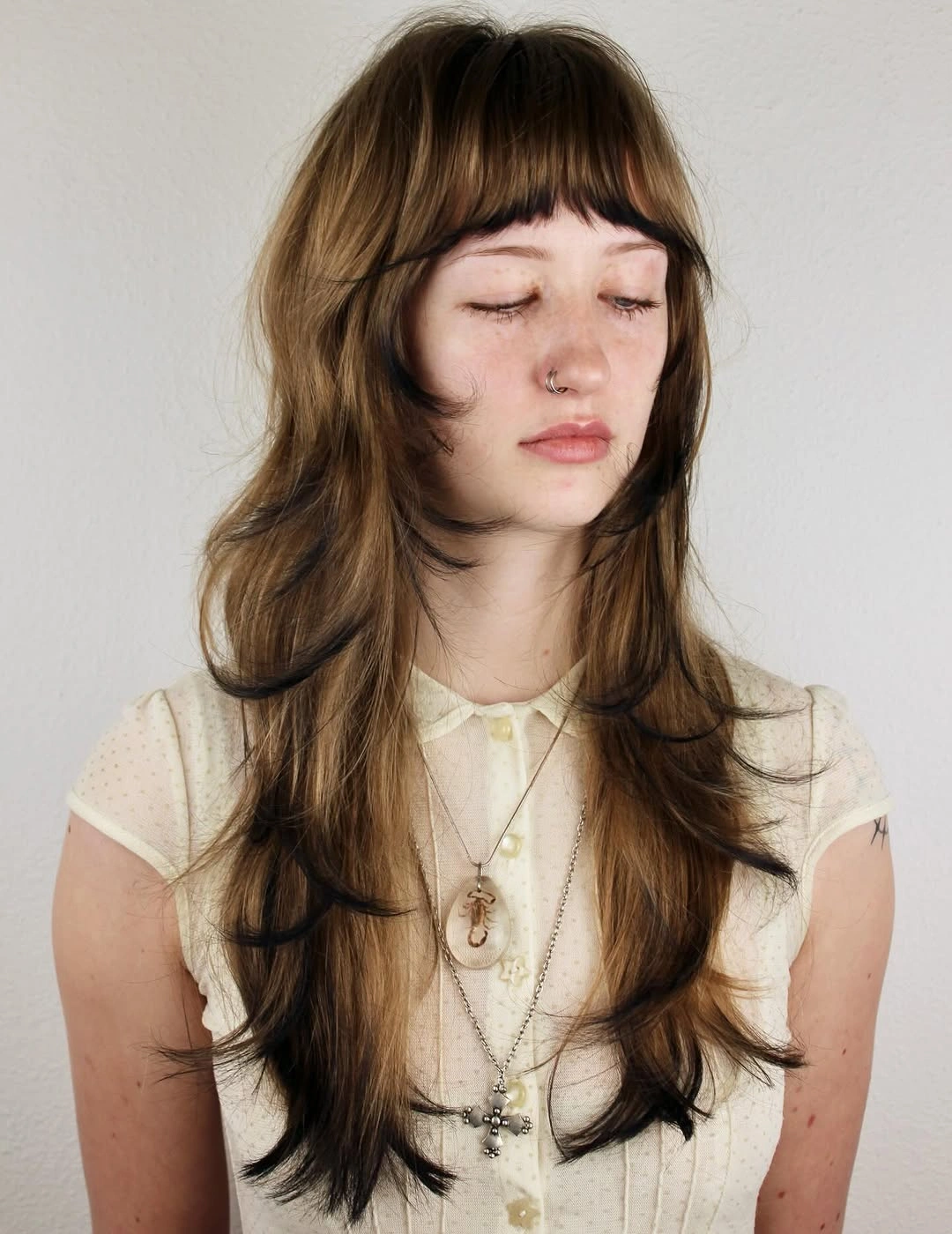 fall hairstyles for long hair 2026 Modern Shag with Airy Bangs and Soft Texture