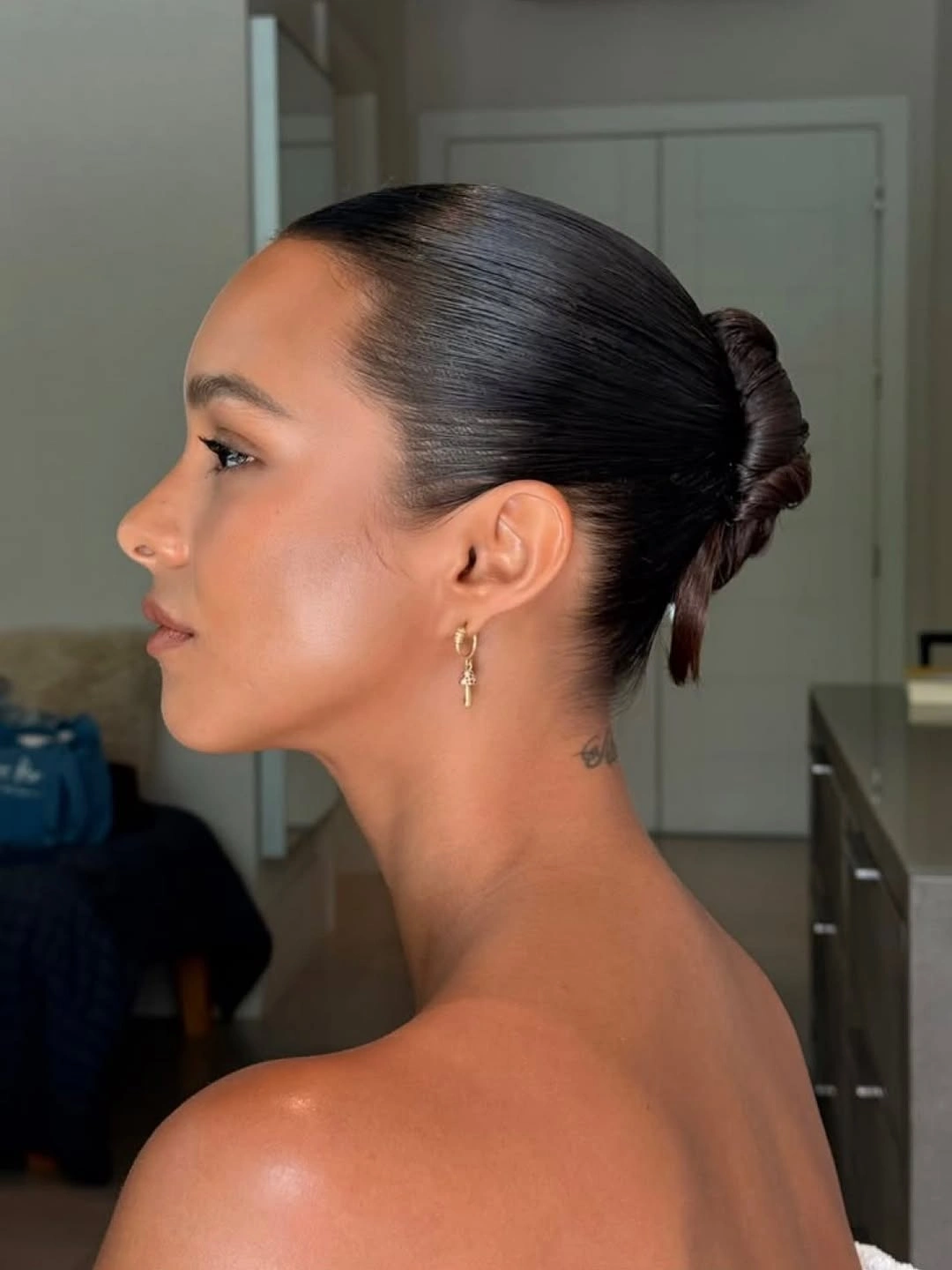 Fall hairstyles for office 2026 Sleek Wrapped Bun That Never Looks Overdone