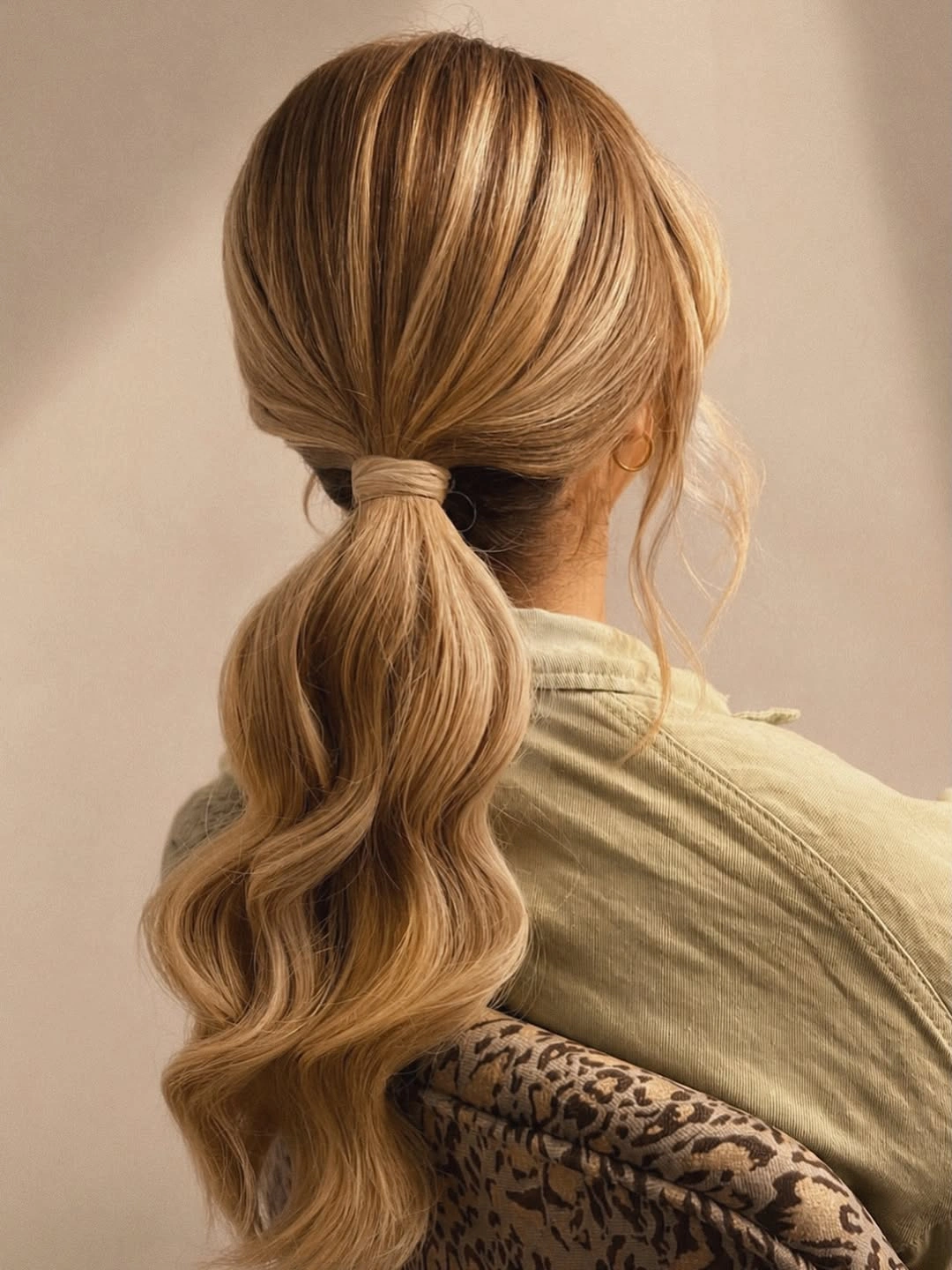 Fall hairstyles for office 2026 Soft Wavy Ponytail with a Wrapped Finish