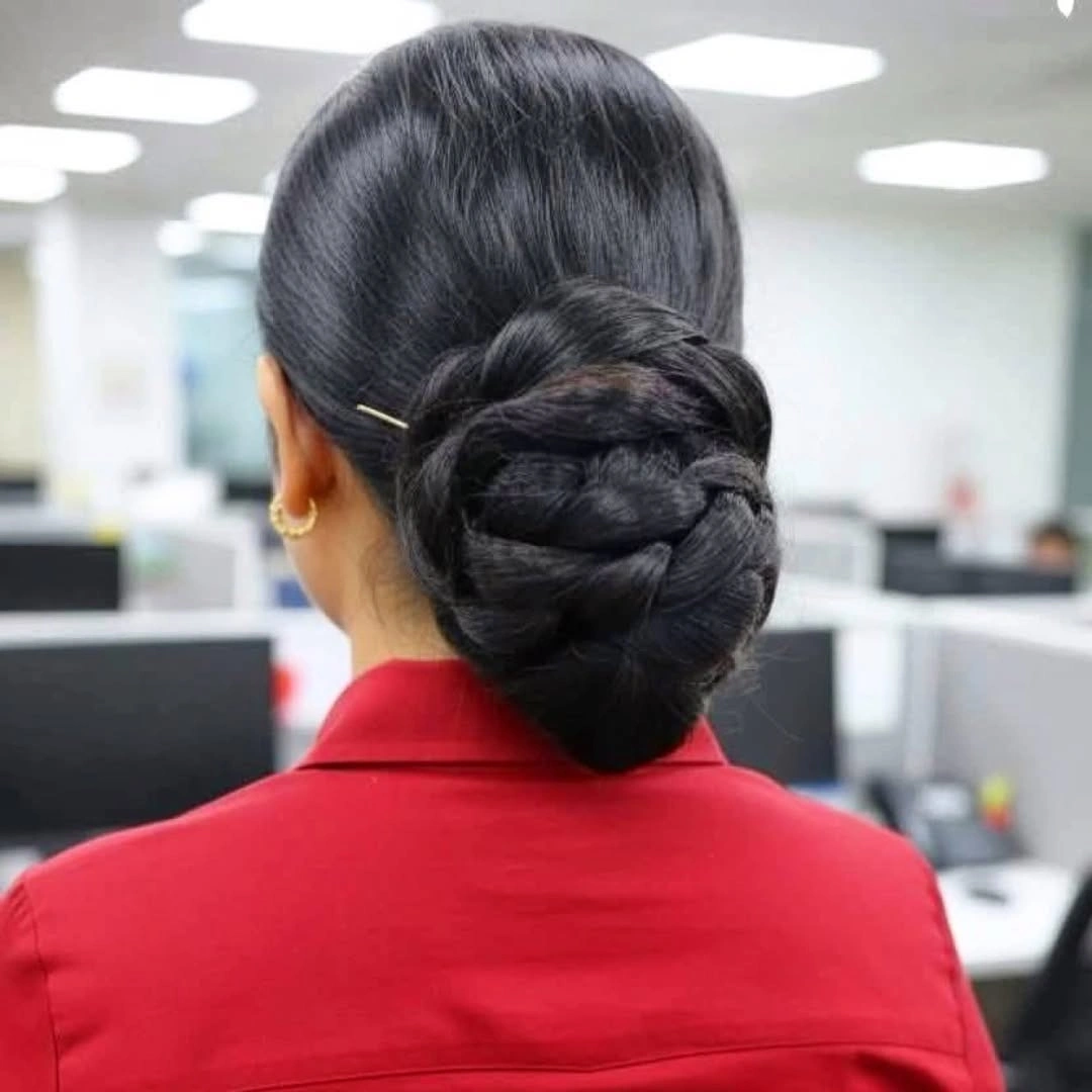 Fall hairstyles for office 2026 Textured Low Braided Bun for Busy Office Days