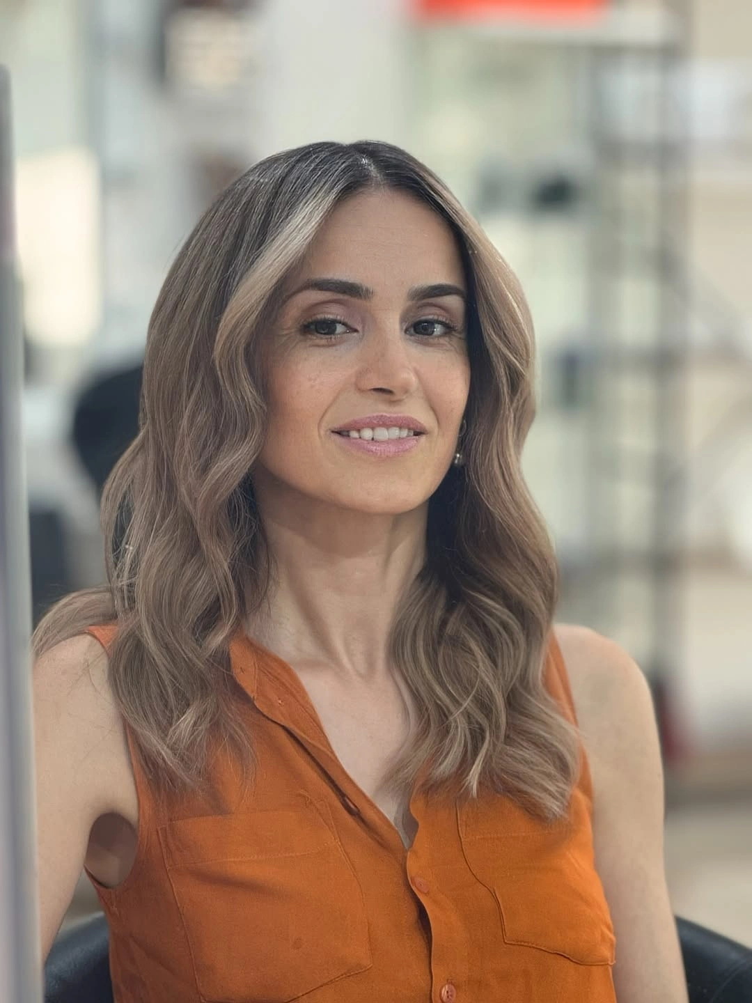 Fall hairstyles for office 2026 Soft Office Waves with a Center Part