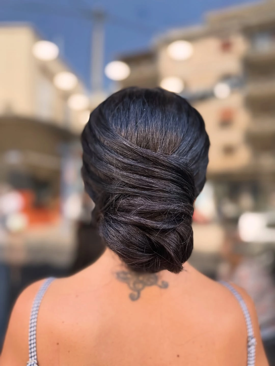 Fall hairstyles for office 2026 Elegant Wrapped Low Updo for Business Meetings