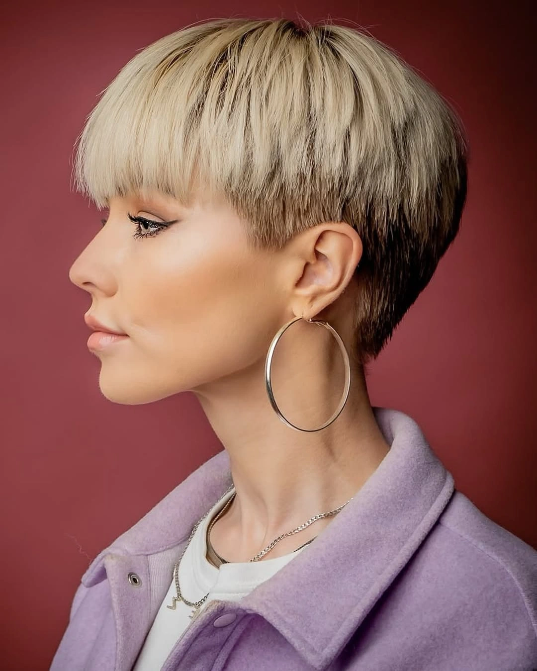 Fall hairstyles for short hair 2026 Platinum Textured Pixie With Soft Full Bangs