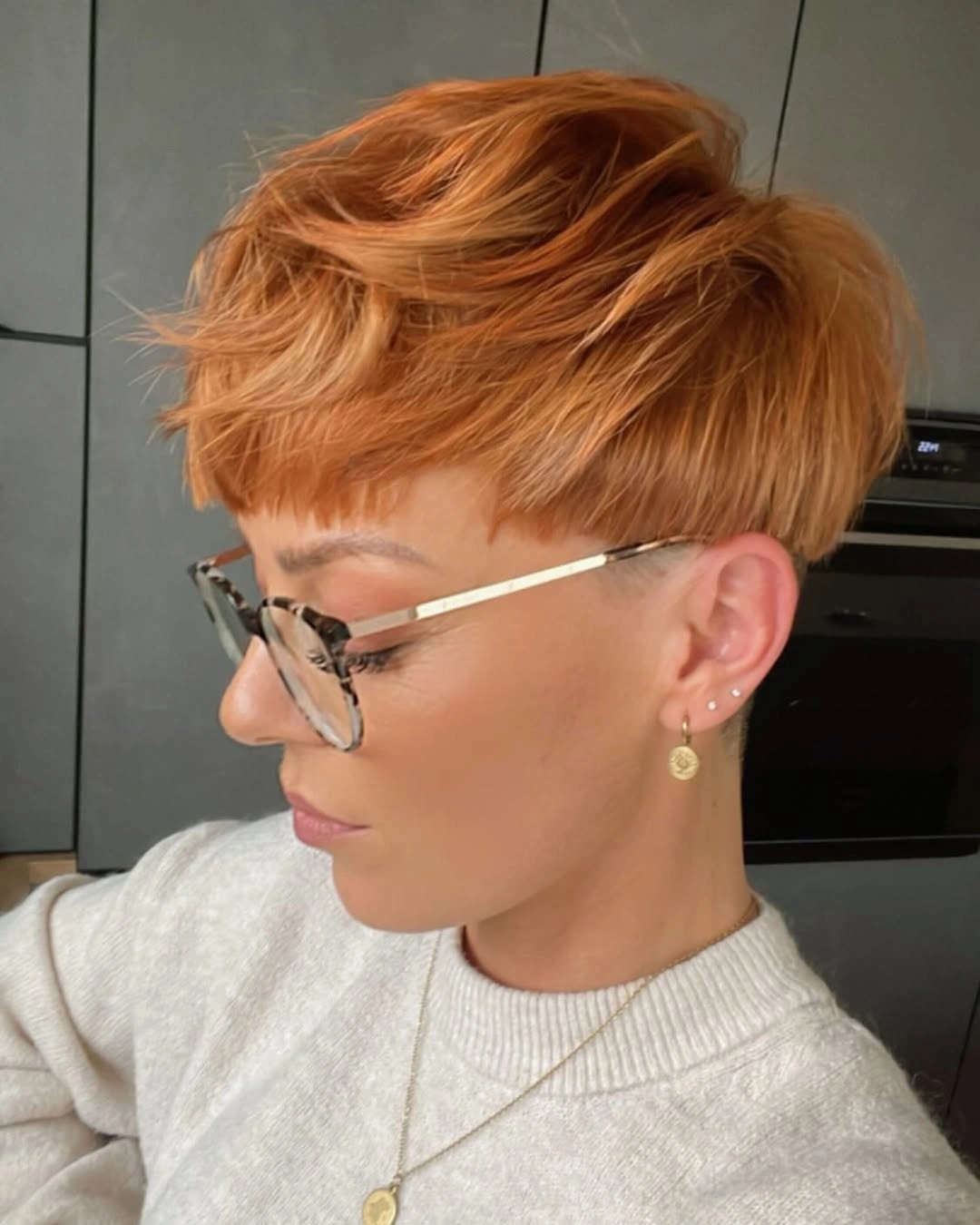 Fall hairstyles for short hair 2026 Golden Copper Pixie Bowl Cut With Modern Edge