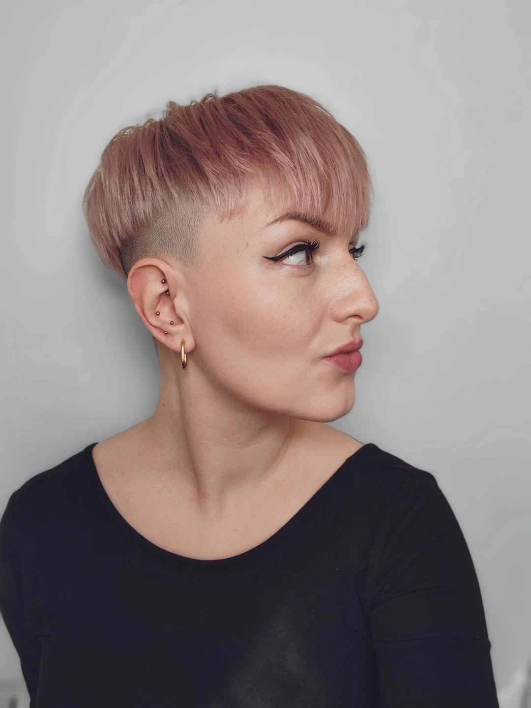Fall hairstyles for short hair 2026 Rose Gold Undercut Pixie With Sculpted Volume